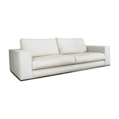 Minotti HAMILTON Cremefarbenes zweisitziges Sofa aus Stoff
