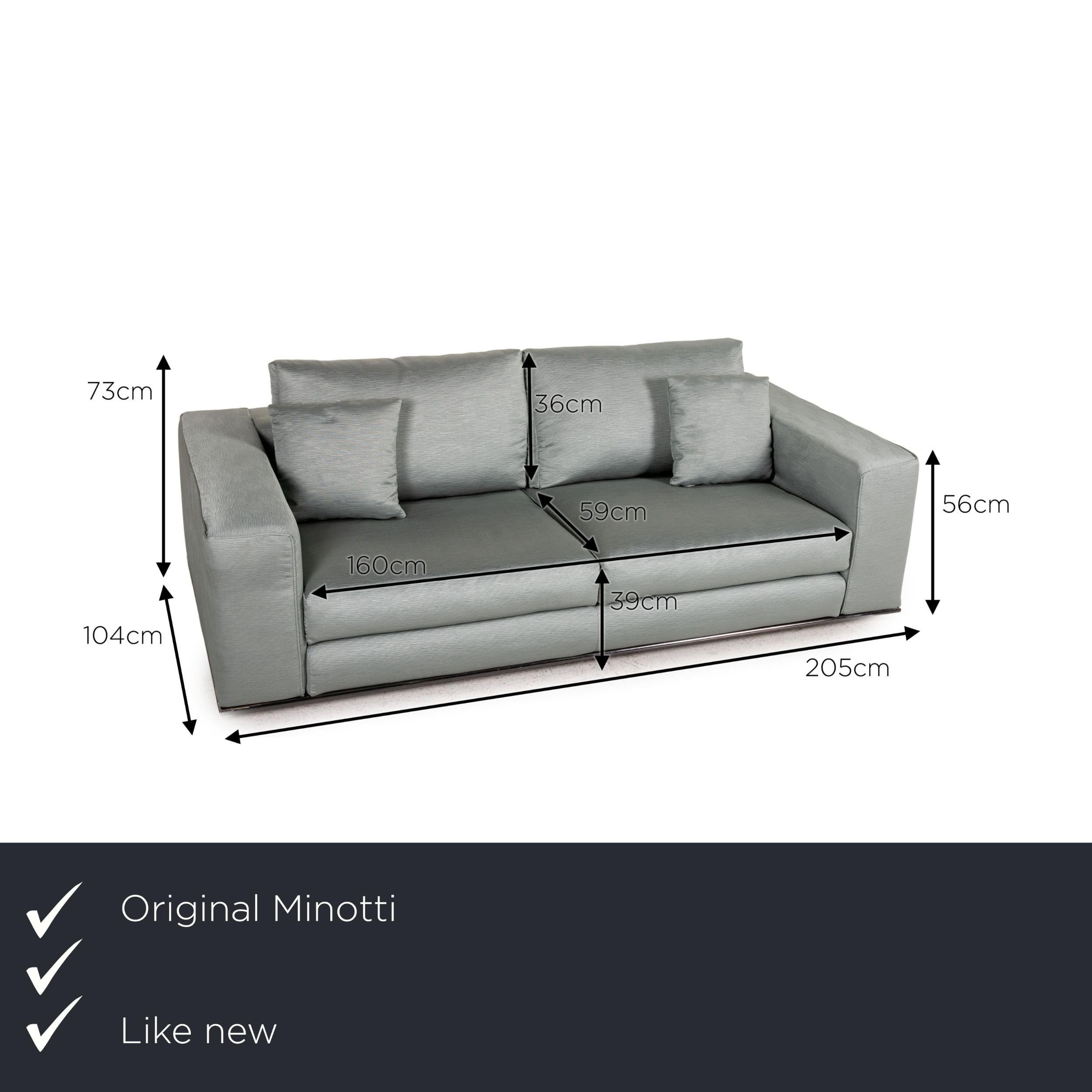 We present to you a Minotti Hamilton fabric sofa green two seater couch.
 
 

 Product measurements in centimeters:
 

 depth: 104
 width: 205
 height: 73
 seat height: 39
 rest height: 56
 seat depth: 59
 seat width: 160
 back height: