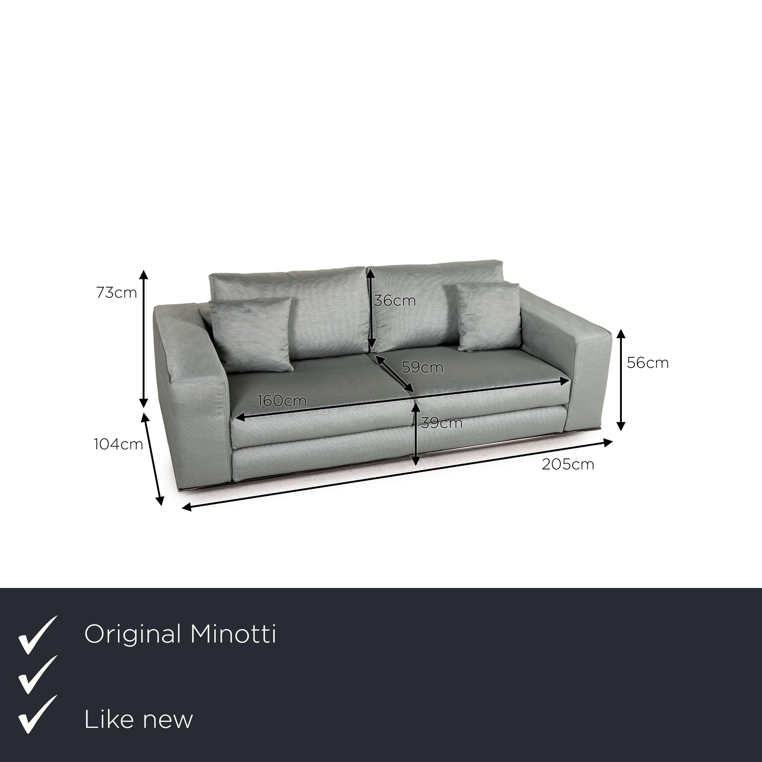 We present to you a Minotti Hamilton Fabric sofa green two seater couch.
 

 Product measurements in centimeters:
 

Depth: 104
Width: 205
Height: 73
Seat height: 39
Rest height: 56
Seat depth: 59
Seat width: 160
Back height: 36.
 