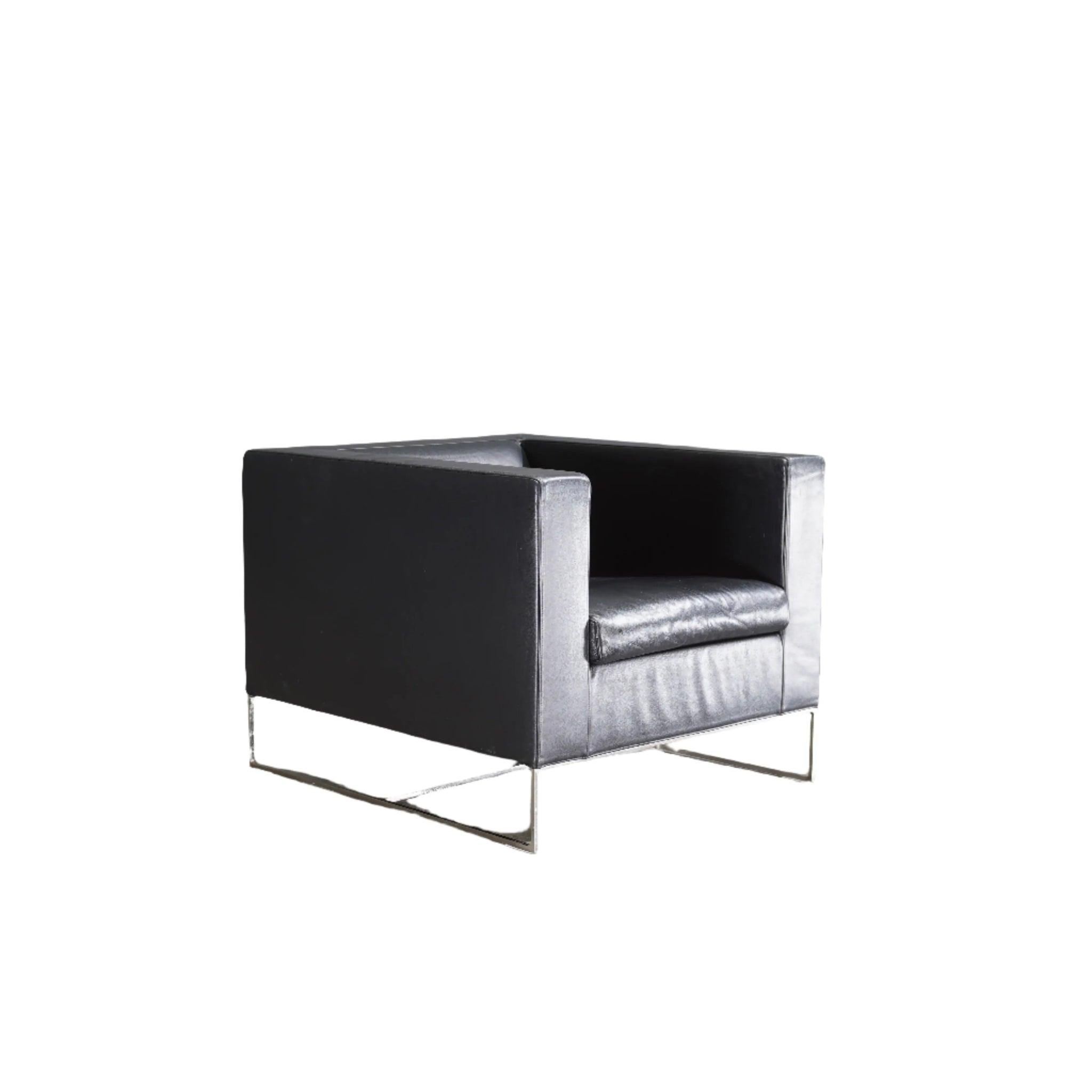 Designed by Rodolfo Dordoni for Minotti in 2017, this leather chair combines modern design with luxurious comfort. The high-quality leather and sleek lines make it a standout piece. Perfect for contemporary living spaces.
