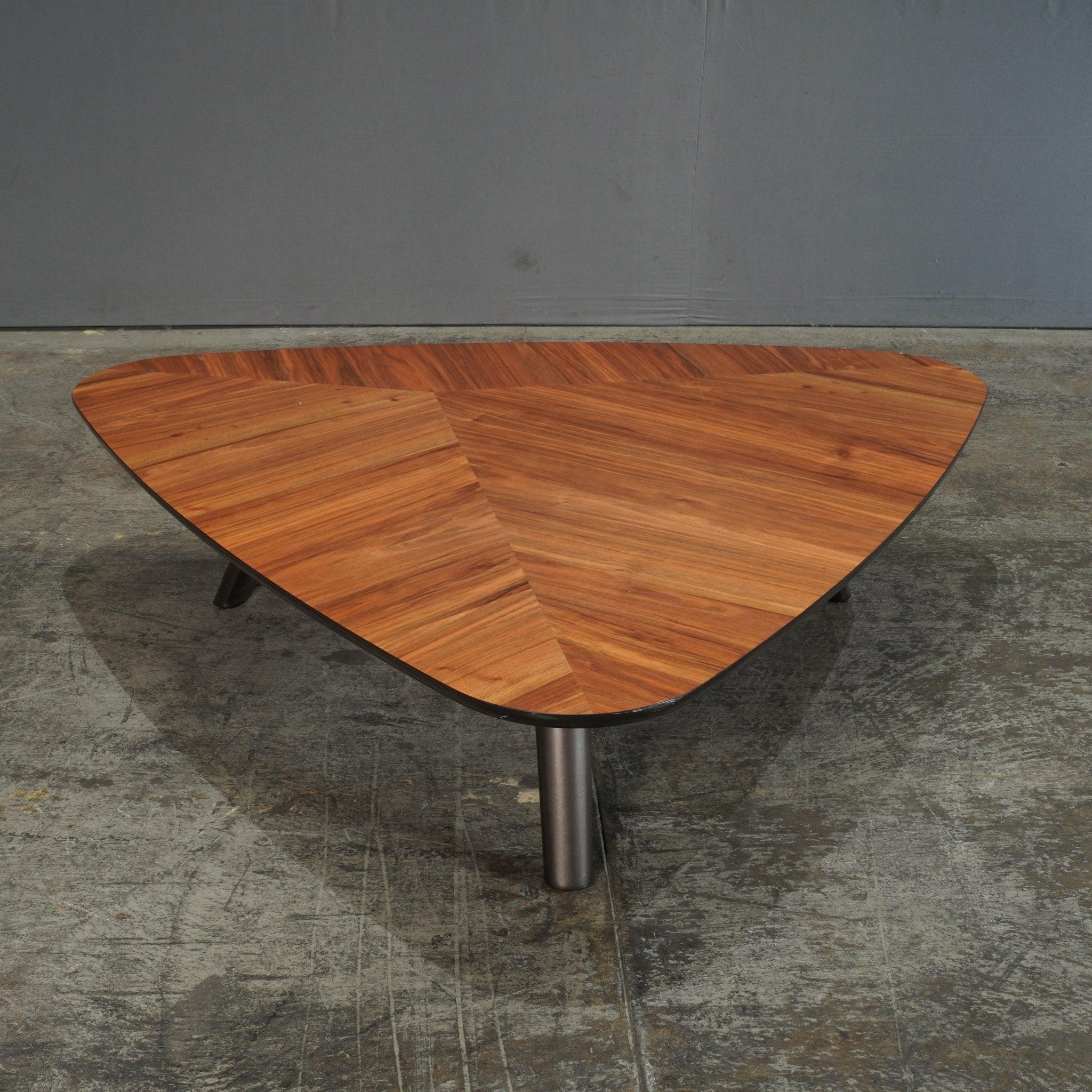 The Minotti Sullivan Triangular Coffee Table by Rodolfo Dordoni combines geometric precision with contemporary luxury. Crafted with a sleek triangular top and finished in rich materials, this statement table is designed to add an architectural edge