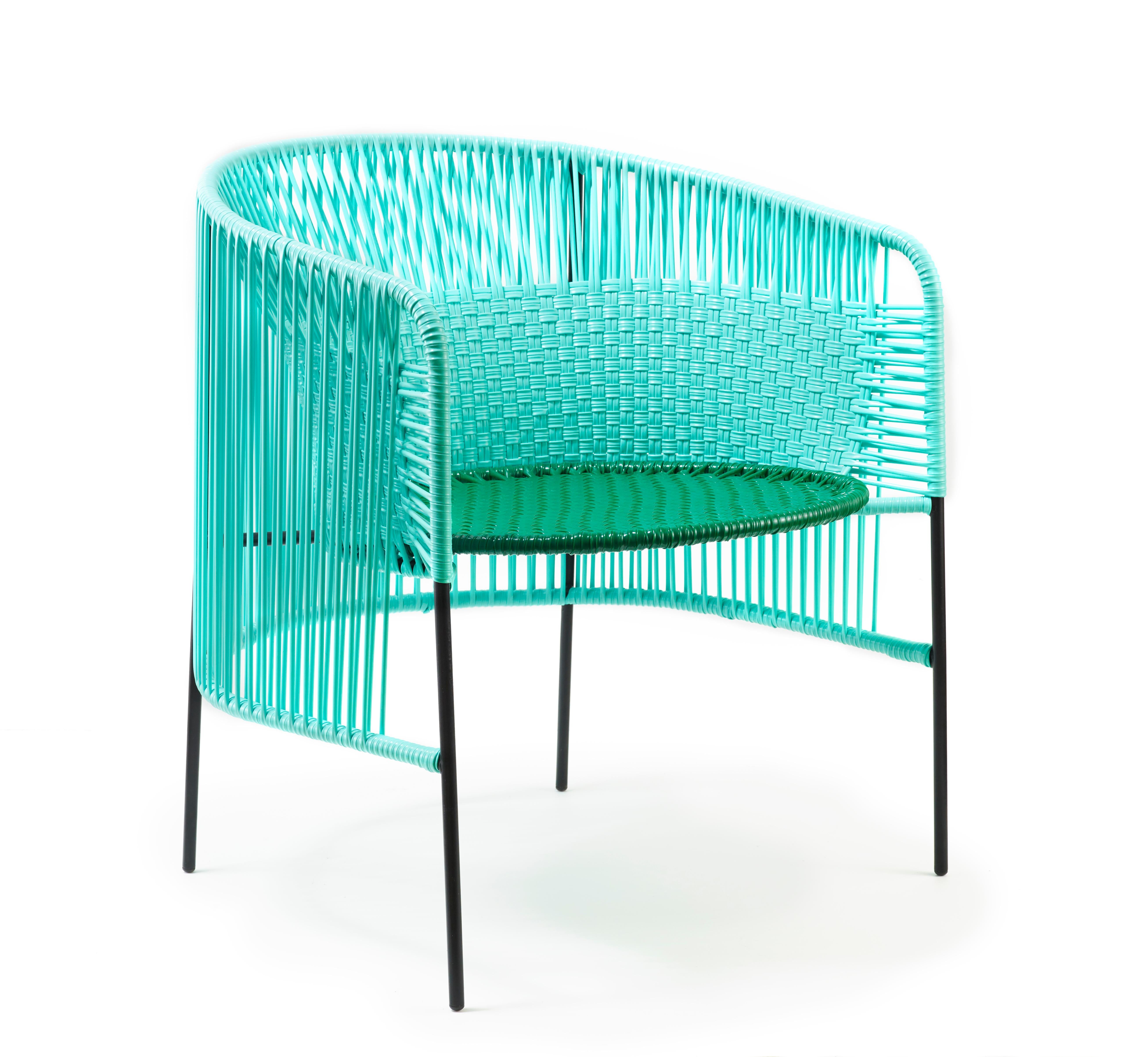 Mint caribe lounge chair by Sebastian Herkner
Materials: Galvanized and powder-coated tubular steel. PVC strings are made from recycled plastic.
Technique: Made from recycled plastic and weaved by local craftspeople in Colombia. 
Dimensions: W