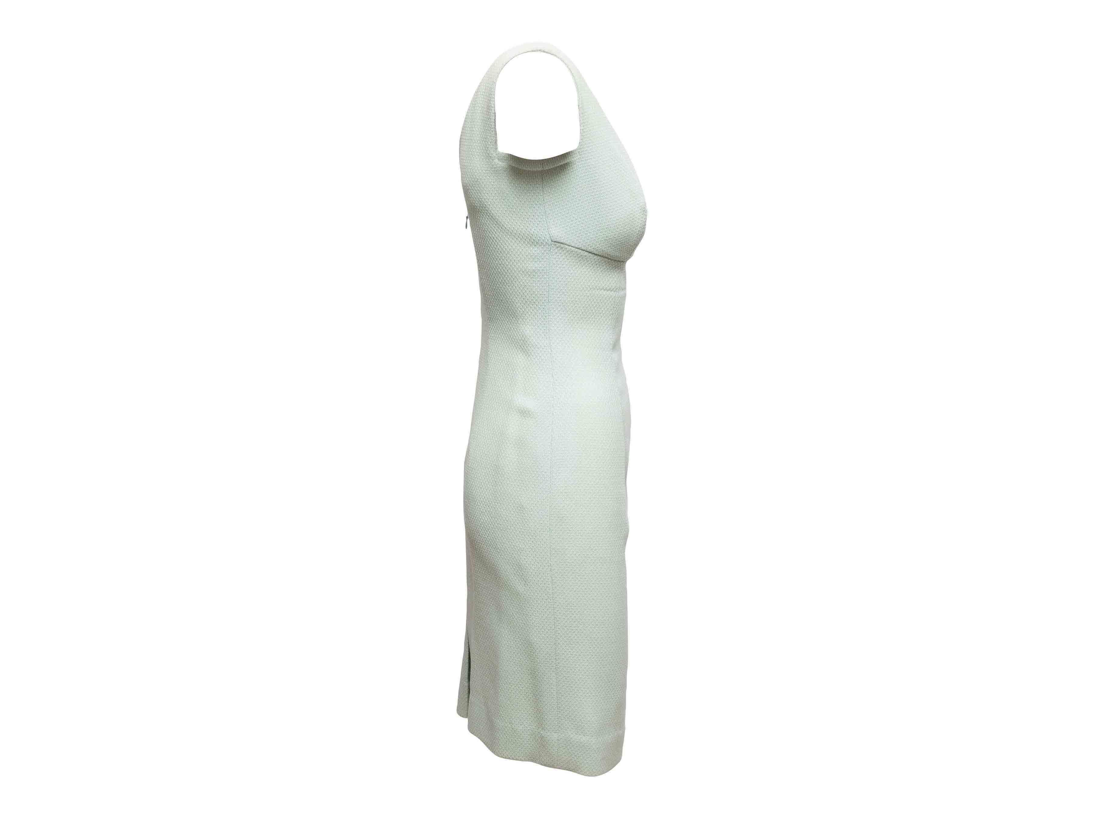 Minzfarbenes, ärmelloses Wollkleid von Christian Dior. V-Ausschnitt. Reißverschluss hinten. 32