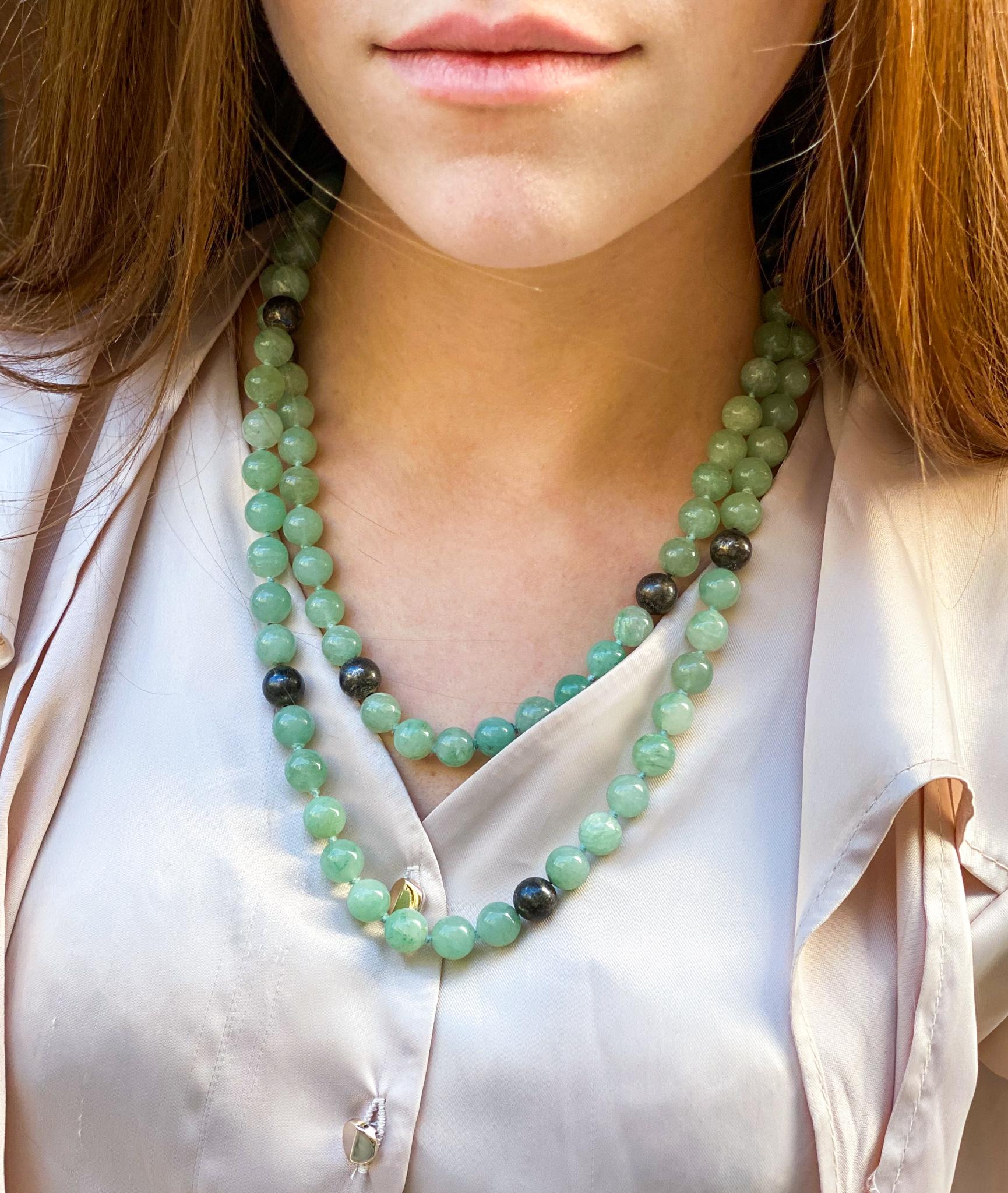 Metal: Silver 

Gemstones: Mint-Green Aventurine 

Dimensions: 40 Inches in Length (around);   .40 Inch Beads 