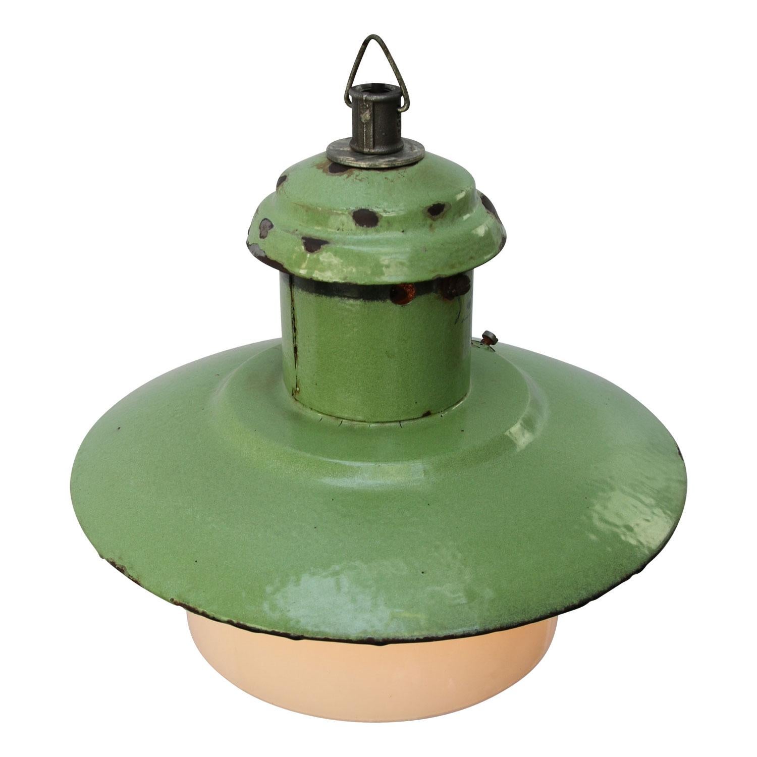 Light green enamel factory pendant from the de Ukraine.
White inside. White opaline glass

Measure: Diameter glass 21 cm

Weight: 2.20 kg / 4.9 lb

Priced per individual item. All lamps have been made suitable by international standards for