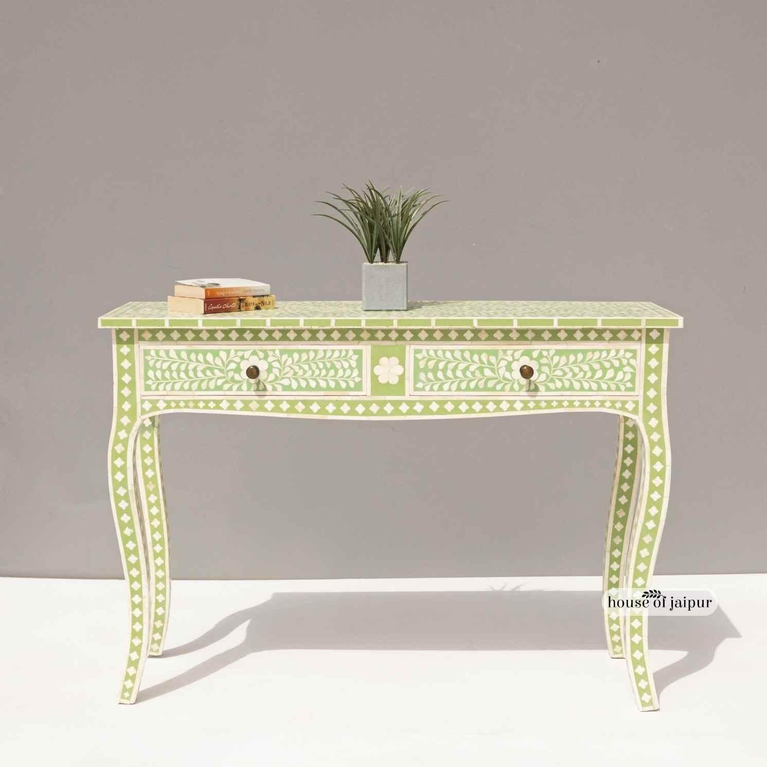 Inspired by classic French Provincial design, this handcrafted Bone Inlay Console Table brings together elegant European curves and the meticulous artistry of Indian craftsmanship. The signature cabriole legs and gentle serpentine apron echo the