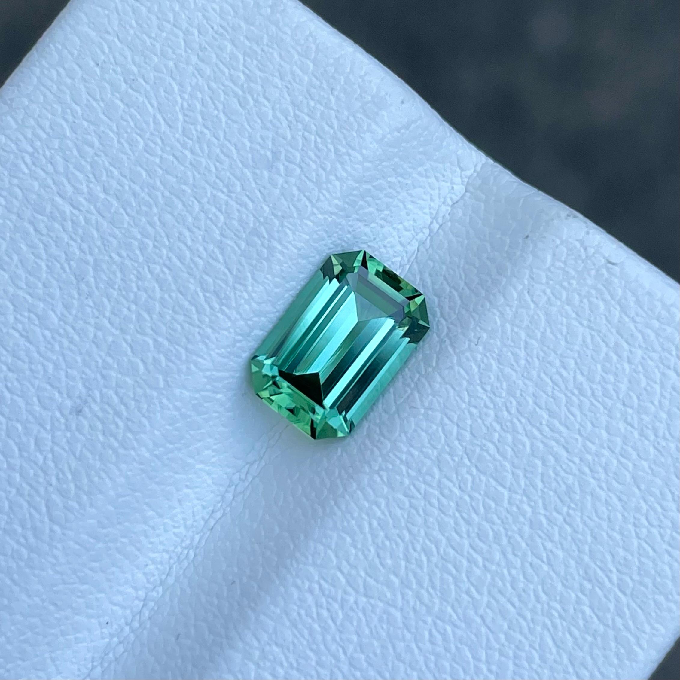 Weight 1.80 carats 
Dimensions 8.9x6.1x4.2 mm
Treatment none 
Origin Afghanistan 
Clarity loupe clean 
Shape octagon 
Cut emerald 




The Mint Green Tourmaline is a true marvel of nature, a gemstone that enchants with its unparalleled beauty. This
