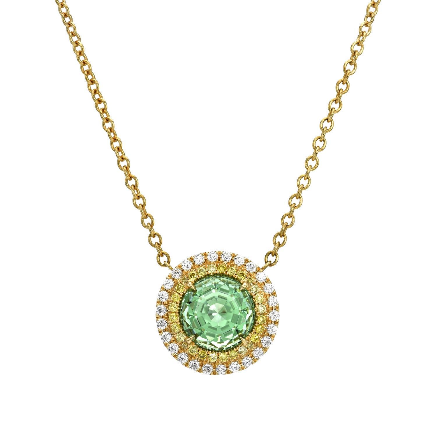 18K yellow gold necklace set with a 3.56 carat Mint Tourmaline round, decorated with a double halo set with a total of 0.20 carat fancy intense yellow diamonds, VS-SI, and a total of 0.30 carat F-G/VS round brilliant diamonds.

Returns are accepted