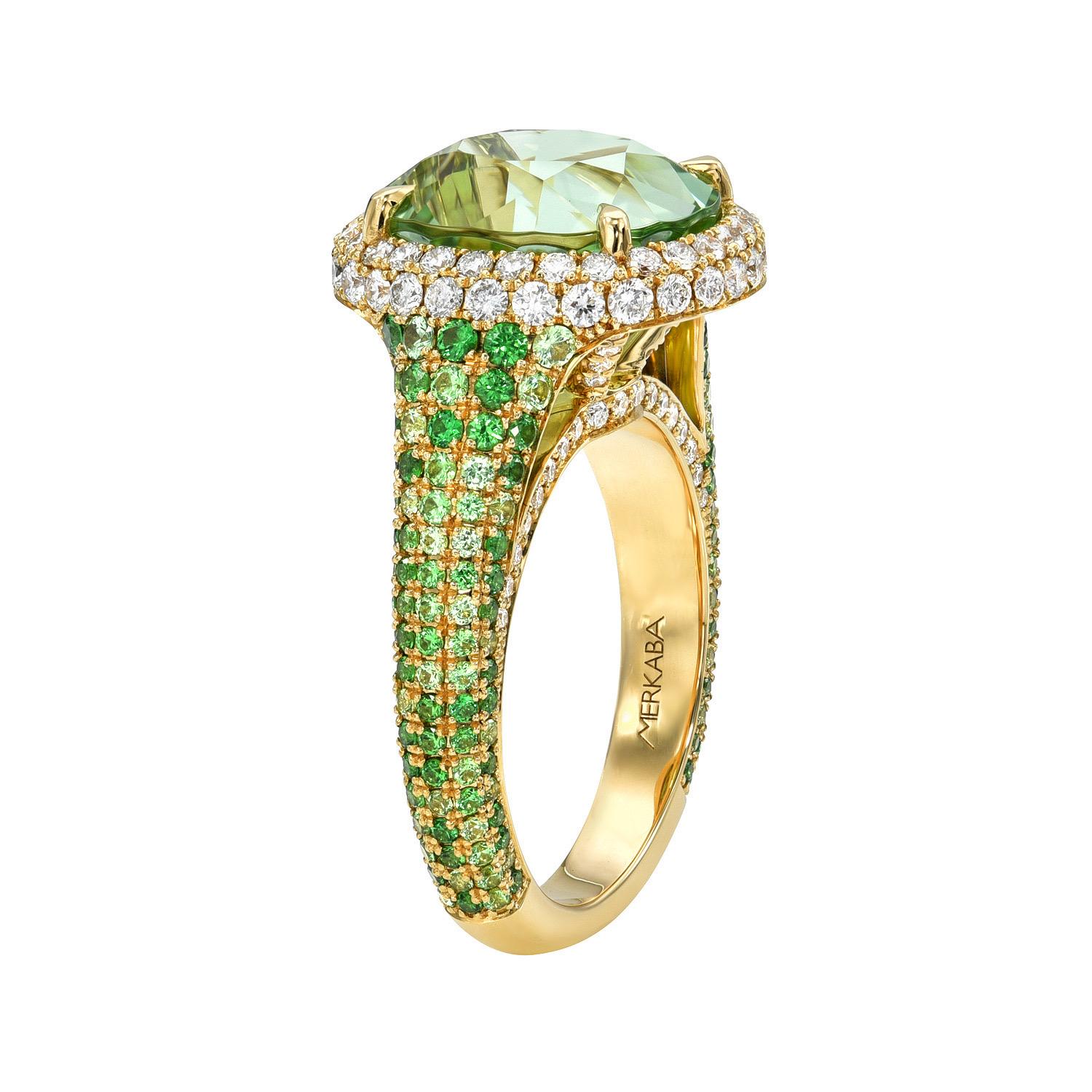 Breathtaking 7.37 carat Mint Green Tourmaline, 18K yellow gold ring, decorated with an array of 1.10 carat Tsavorites, and a total of 0.85 carat round brilliant diamonds.
Ring size 6.5. Resizing is complementary upon request.
Returns are accepted