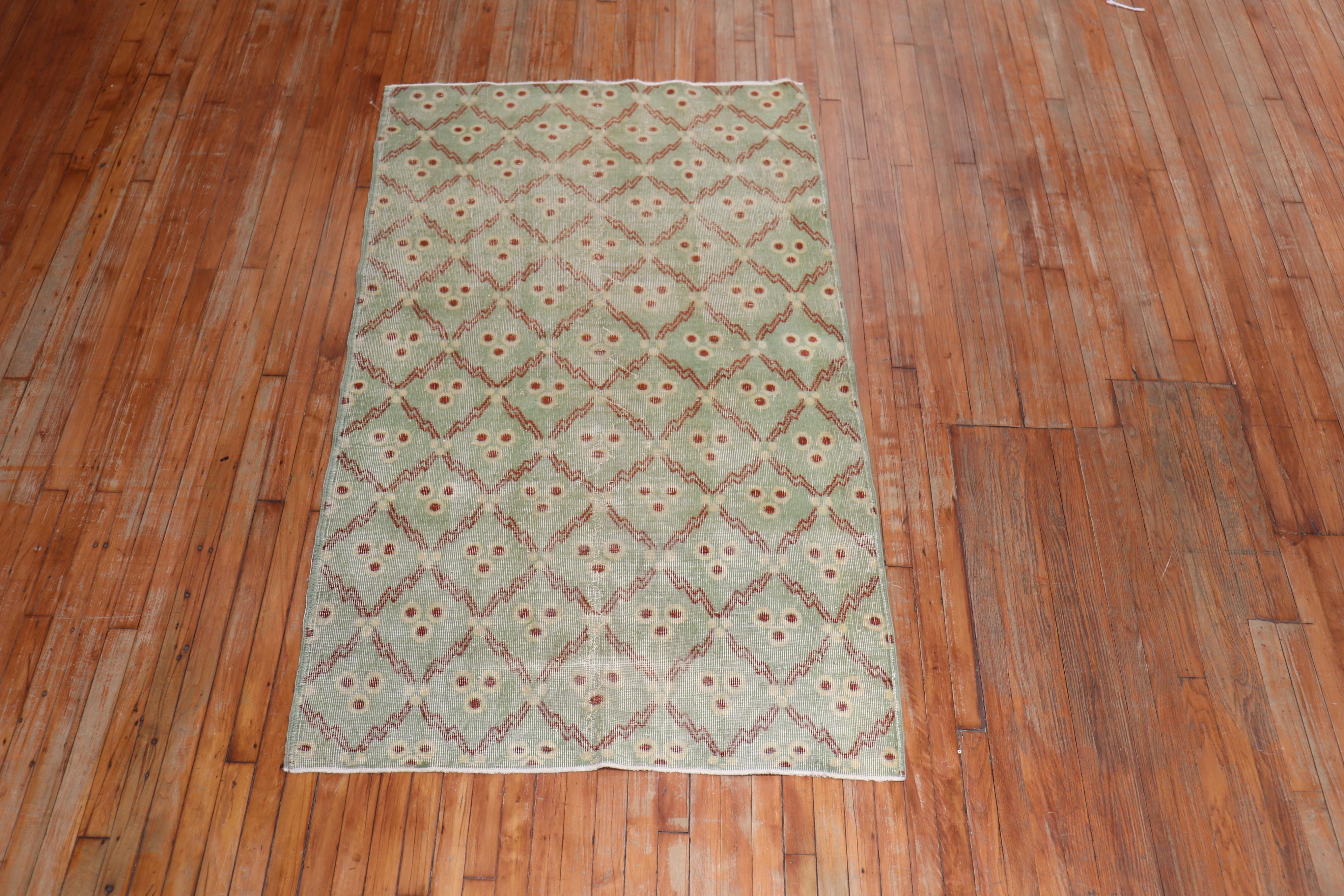 Mint green-colored mid-century Turkish Anatolian rug with an infamous cintomani motif

Measures: 3'10'' x 6'8''.