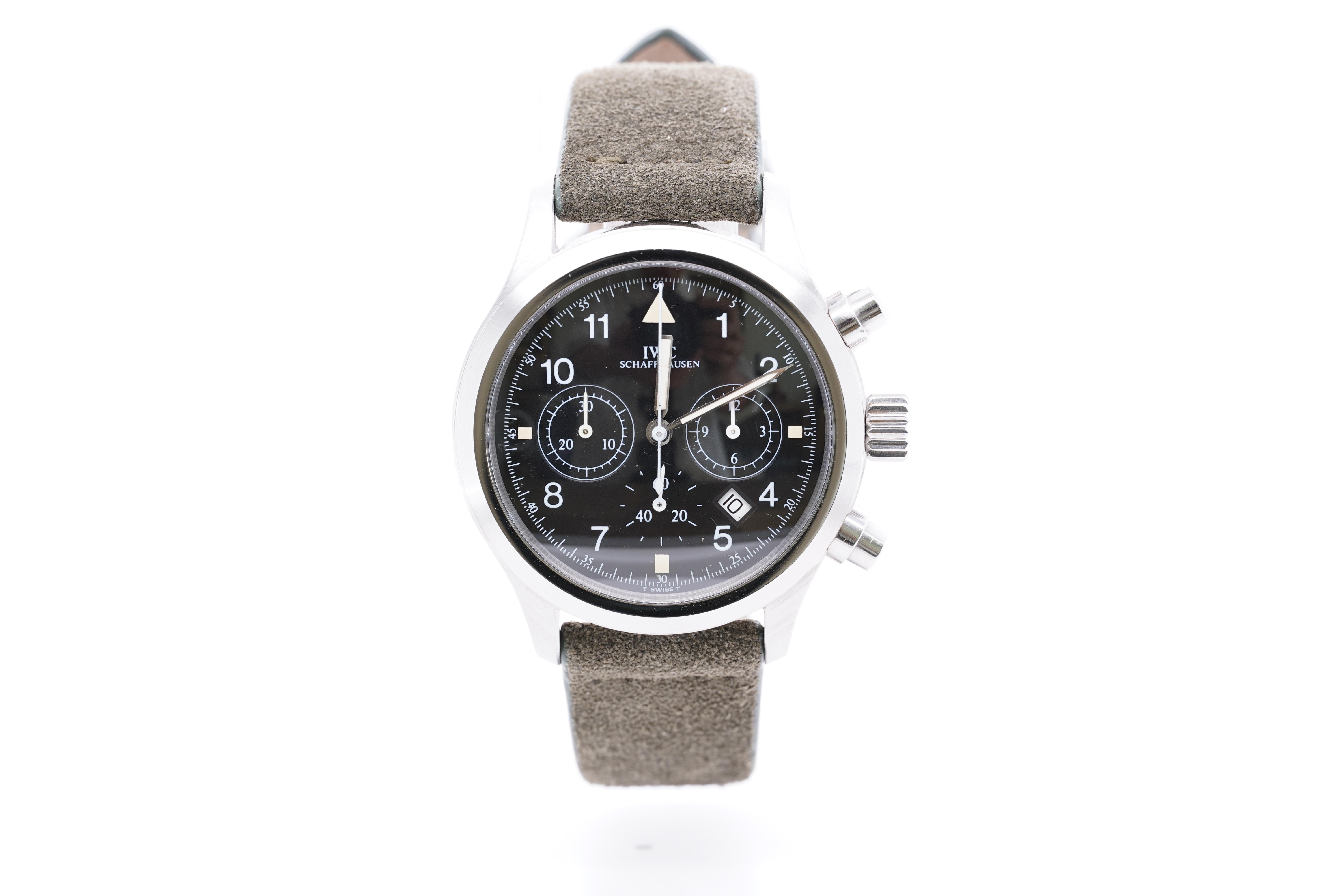 IWC Schaffhausen Fliegerchronograph Aviator (23.3mm) Pilot's Watch Grey Suede Strap, Original Box, Pre-Owned
Serial # 2611863
Free shipping anywhere in the US.

IWC International Watch Co. AG, also known as IWC Schaffhausen, is a luxury Swiss watch