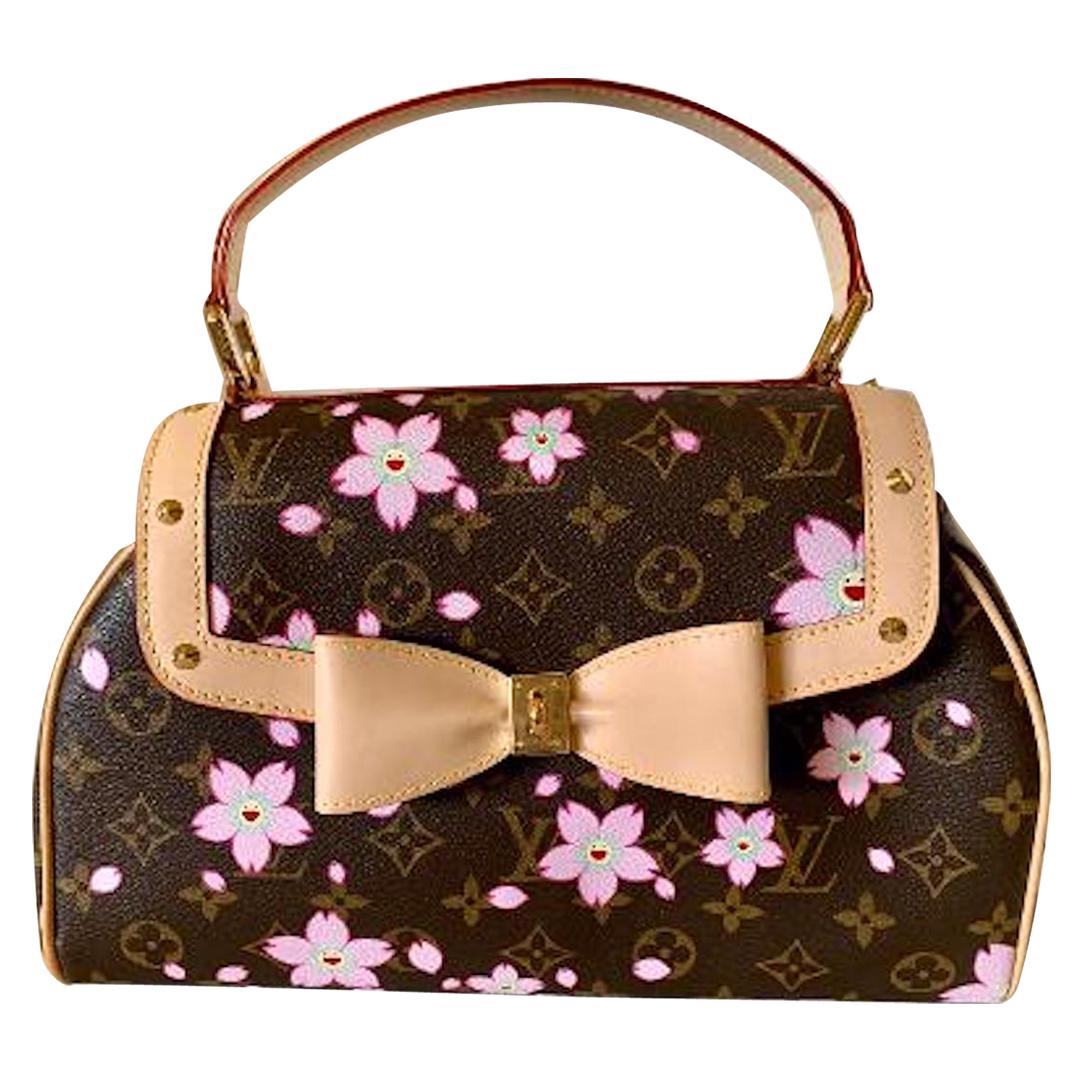 How Louis Vuitton & Takashi Murakami's Monogram Bags Became A 2000s-Era  It Bag