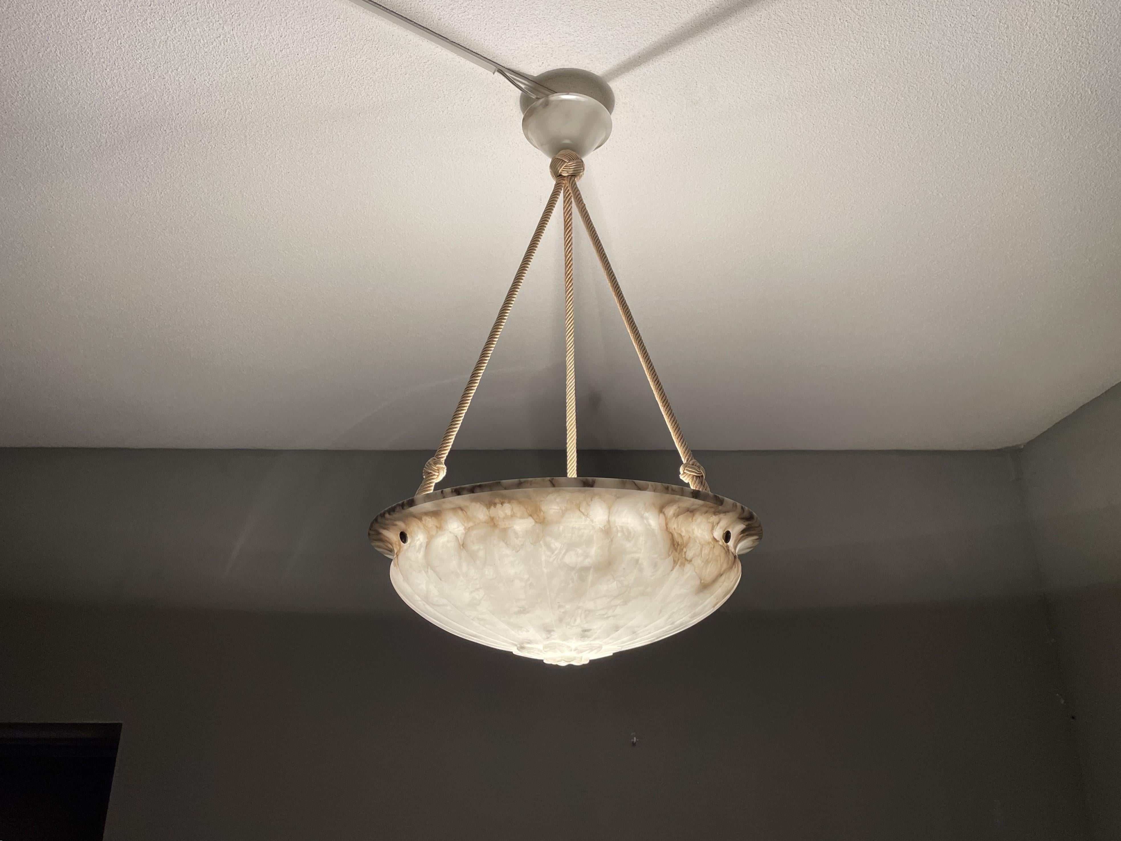 Exceptional antique alabaster chandelier for an entry hall, bedroom or any other room.

With these alabaster pendants being one of our specialities, we always enjoy finding the best of the best and this amazing specimen totally fits that bill. So if