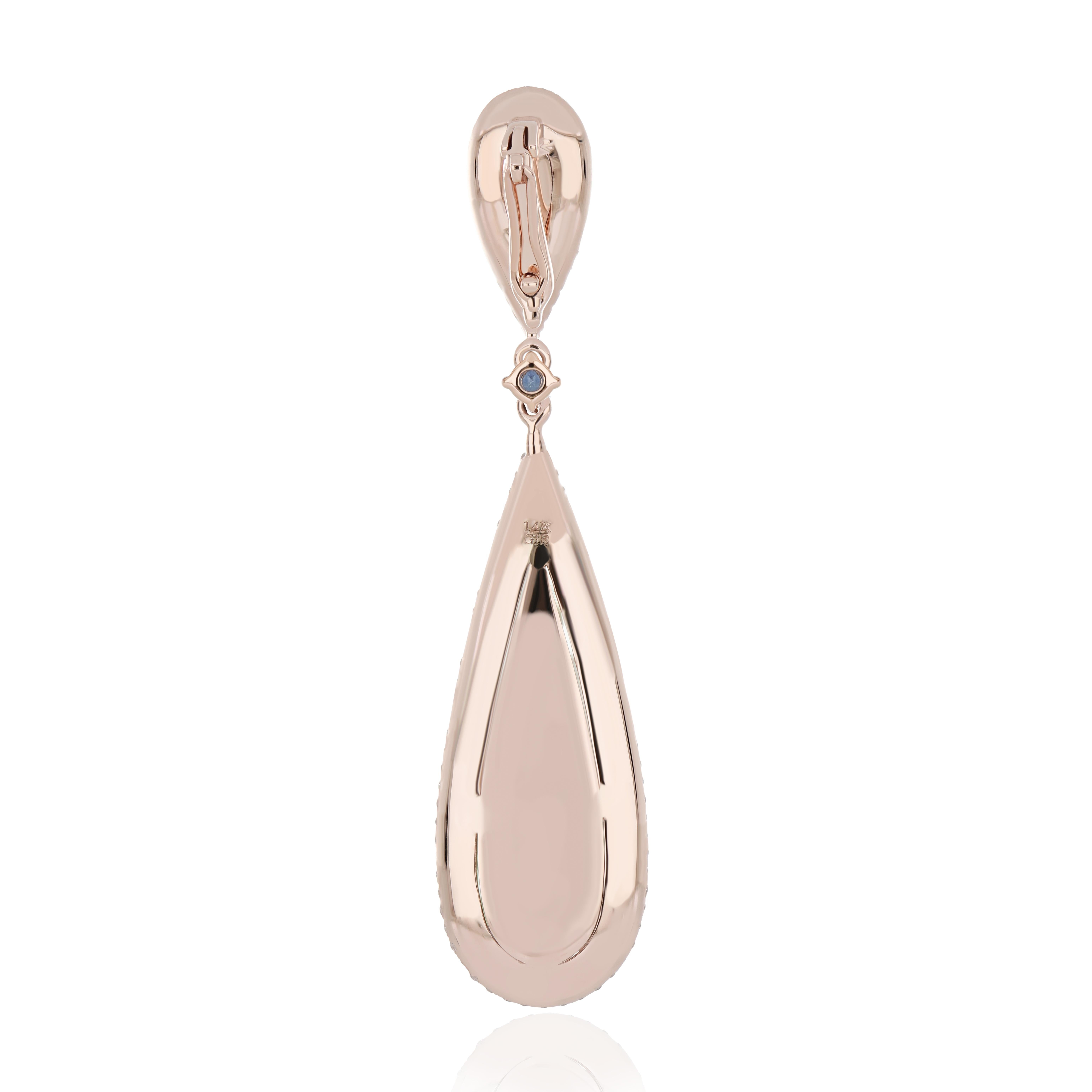 Experience the Epitome of Luxury: Impeccably Detailed 14 Karat Rose Gold Pendant, featuring a Stunning  13.75 Cts (approx.) Pear-Cut Mint Quartz Embellished with Micro-Set Diamonds Weighing Approximately 0.35 CT's.with contrasting Pear Shape