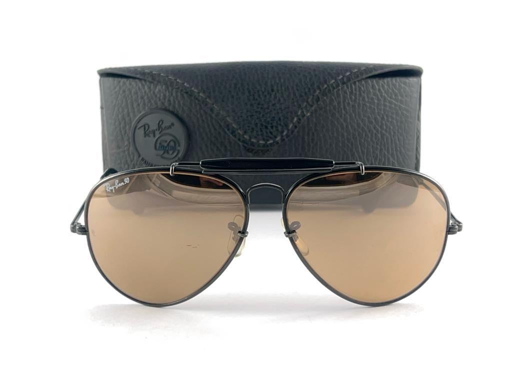 Mint 50th Anniversary Black Edition 1937-1987 Ray Ban 
Ray Ban 50 written on the right lens. B&L Ray Ban Usa. Under the bridge 62 [] 14. Comes with original leather black Ray Ban Bausch and Lomb case. 

This item have visible sign of wear on the