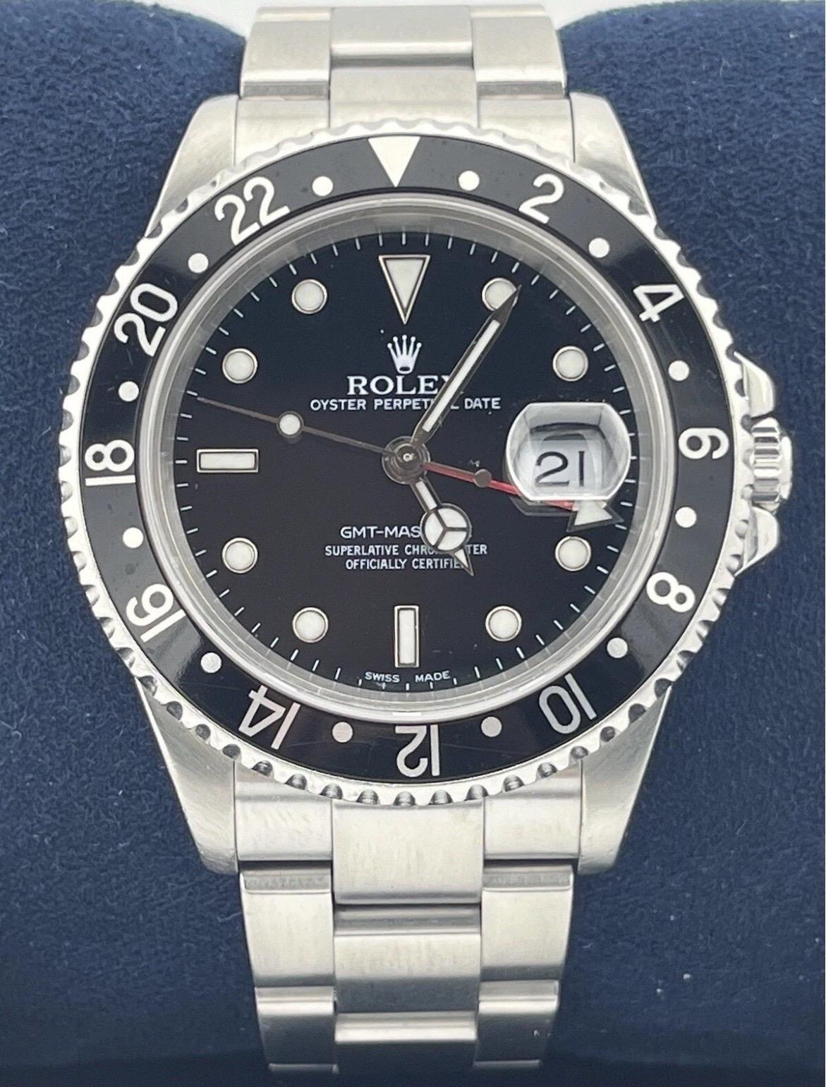 MINT Rolex GMT-Master II 40mm Stainless Steel 16710 Black Men's Watch Papers In Good Condition For Sale In Boca Raton, FL