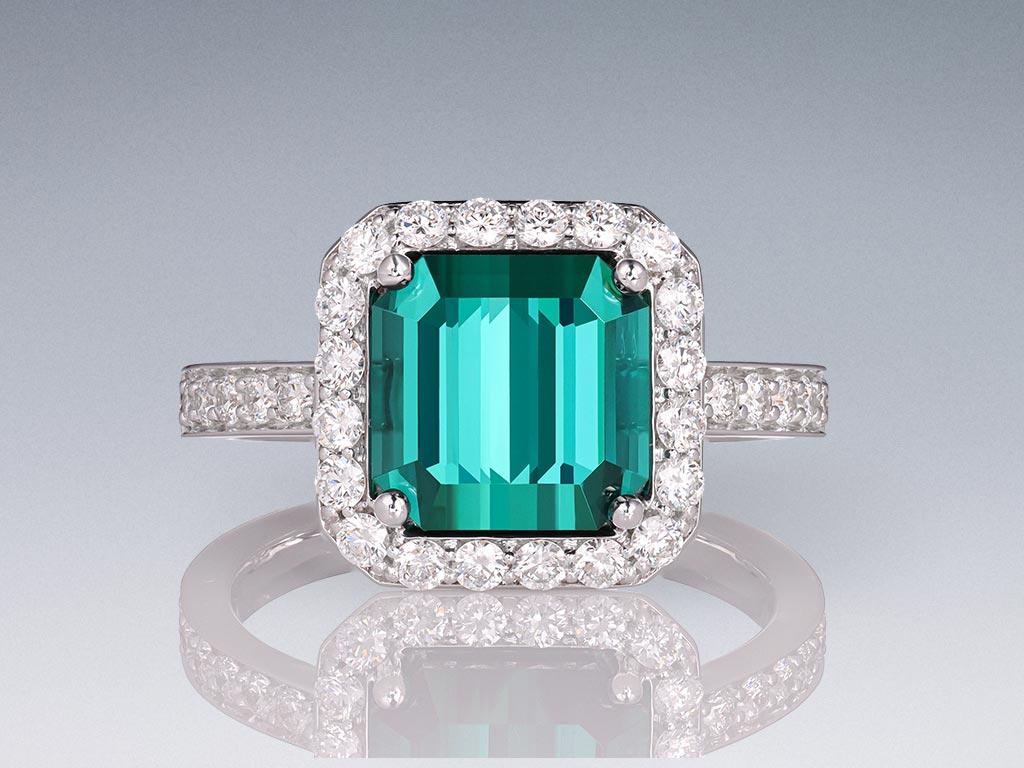 Introducing the epitome of elegance: our 3.65 carat Green-Blue Indicolite Tourmaline ring. Crafted to perfection, this stunning piece features a stylish octagon-cut shape, accentuating the rich hue and vibrant play of the exquisite