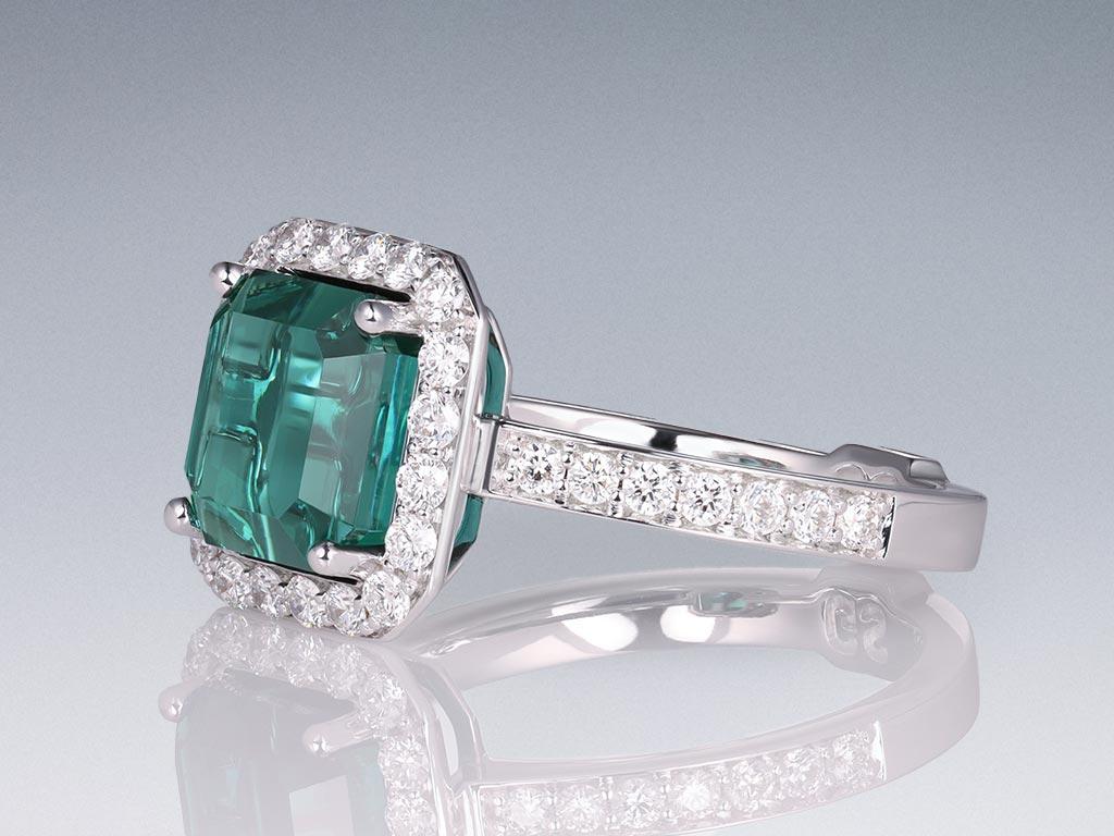 Octagon Cut Green-Blue Indicolite Tourmaline 3.65 carat Ring with diamonds in 18K white gold For Sale