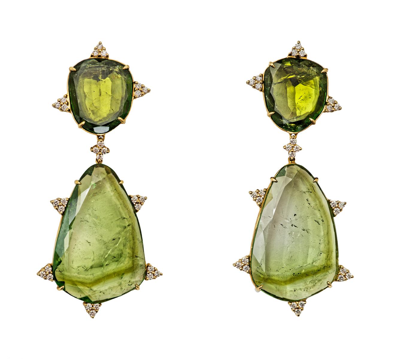 Pair of mint tourmaline slice earrings, accented with circular-cut diamond trefoil motifs, mounted in 18K gold.

Description:
Gem Material Details: The mint tourmaline slices are all Brazilian in origin and together weigh approximately 106.83 cts.