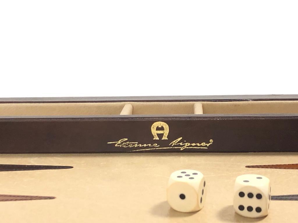 Gently played, vintage 1970 backgammon rare Etienne Aigner handmade soft leather complete set , a rare find since they were just a few made guaranteeing the maximum level of craftsmanship and luxury. The case has minor distress on the leather, flaws