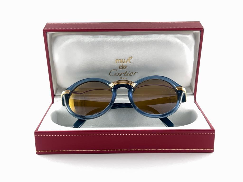 Women's or Men's Mint Vintage Cartier Cabriolet Round Translucent Blue 49MM 18K Sunglasses France