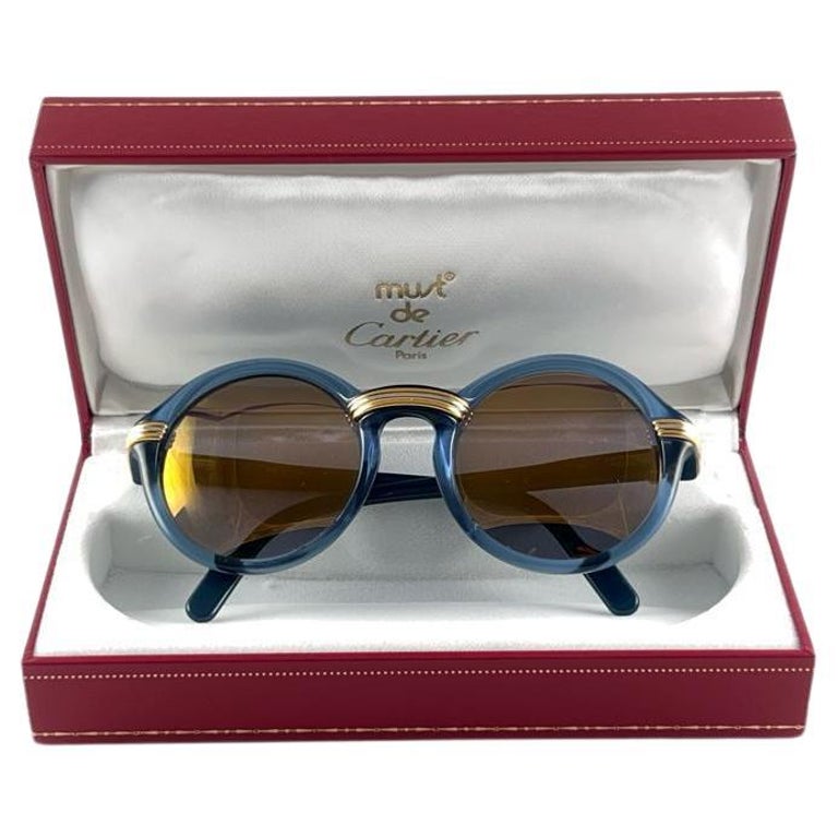 Mint Vintage Cartier Cabriolet Round Translucent Blue 49MM 18K Sunglasses  France En vente sur 1stDibs