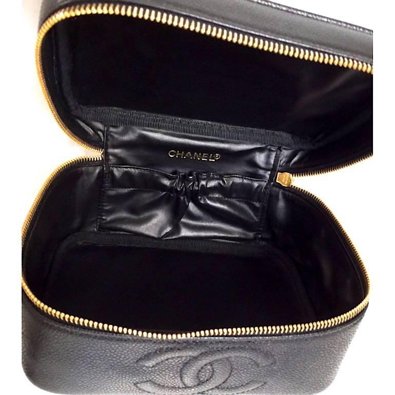 Women's  Chanel Vintage black caviar cosmetic toiletry and party vanity bag 