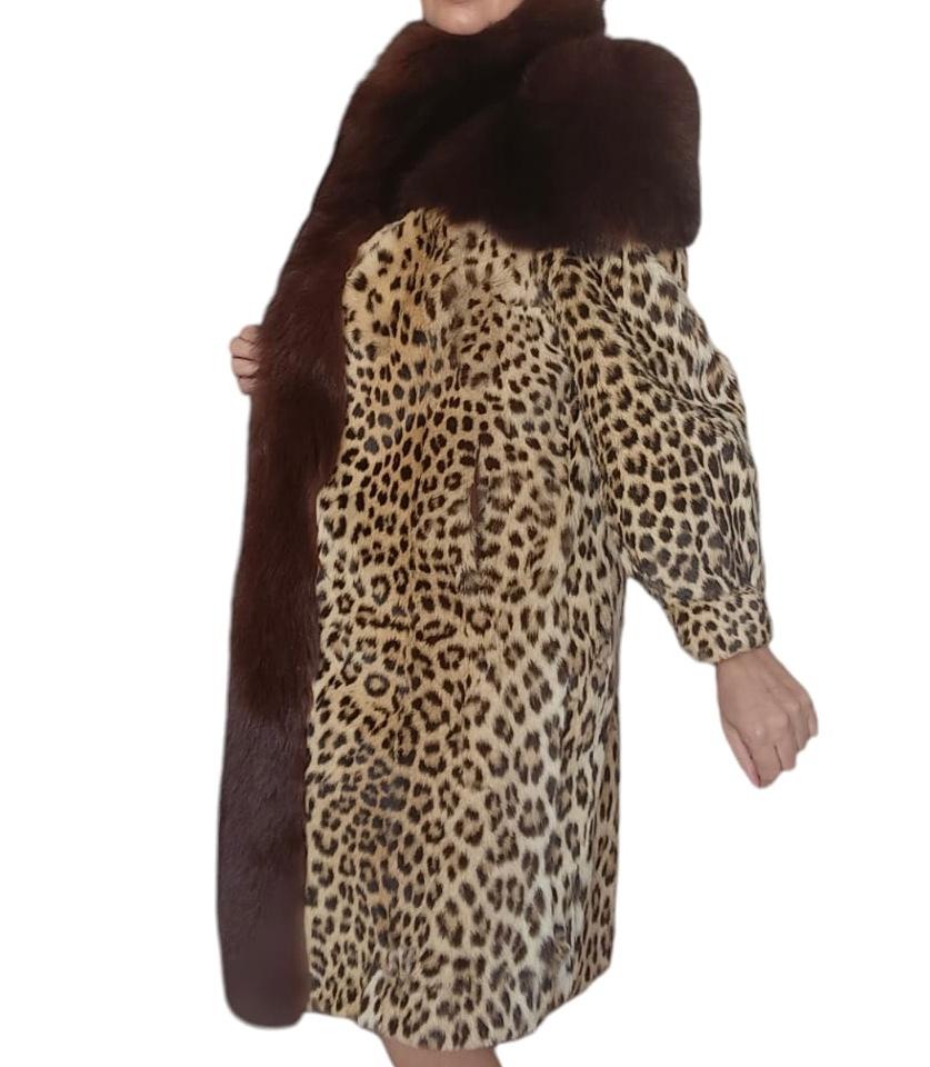 PRODUCT DESCRIPTION:

Mint Vintage Leopard fur coat***frozen vault size Small 6

Condition: Mint condition

Closure: Metal clasp

Color: Orange brown and black

Material: Leopard Fur

Garment type: leopard fur coat 

Sleeves: Straight with mink cuff