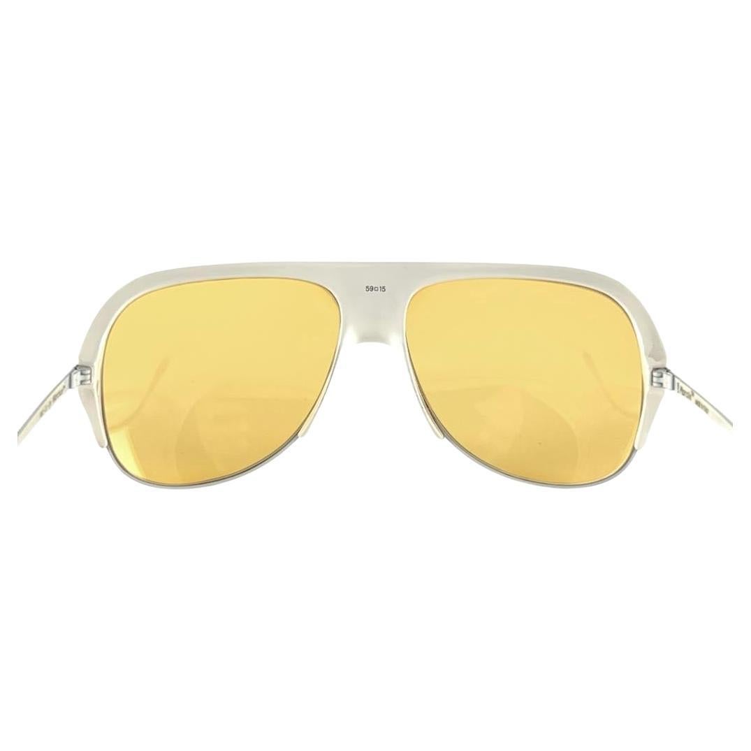 Mint Vintage Marcolin white frame sunglasses with light yellow Lenses 

This Item May Show Minor Sign Of Wear Due To Storage


Made In Italy

Front                                       14 Cms 
Lens Height                             5 Cms
 Lens