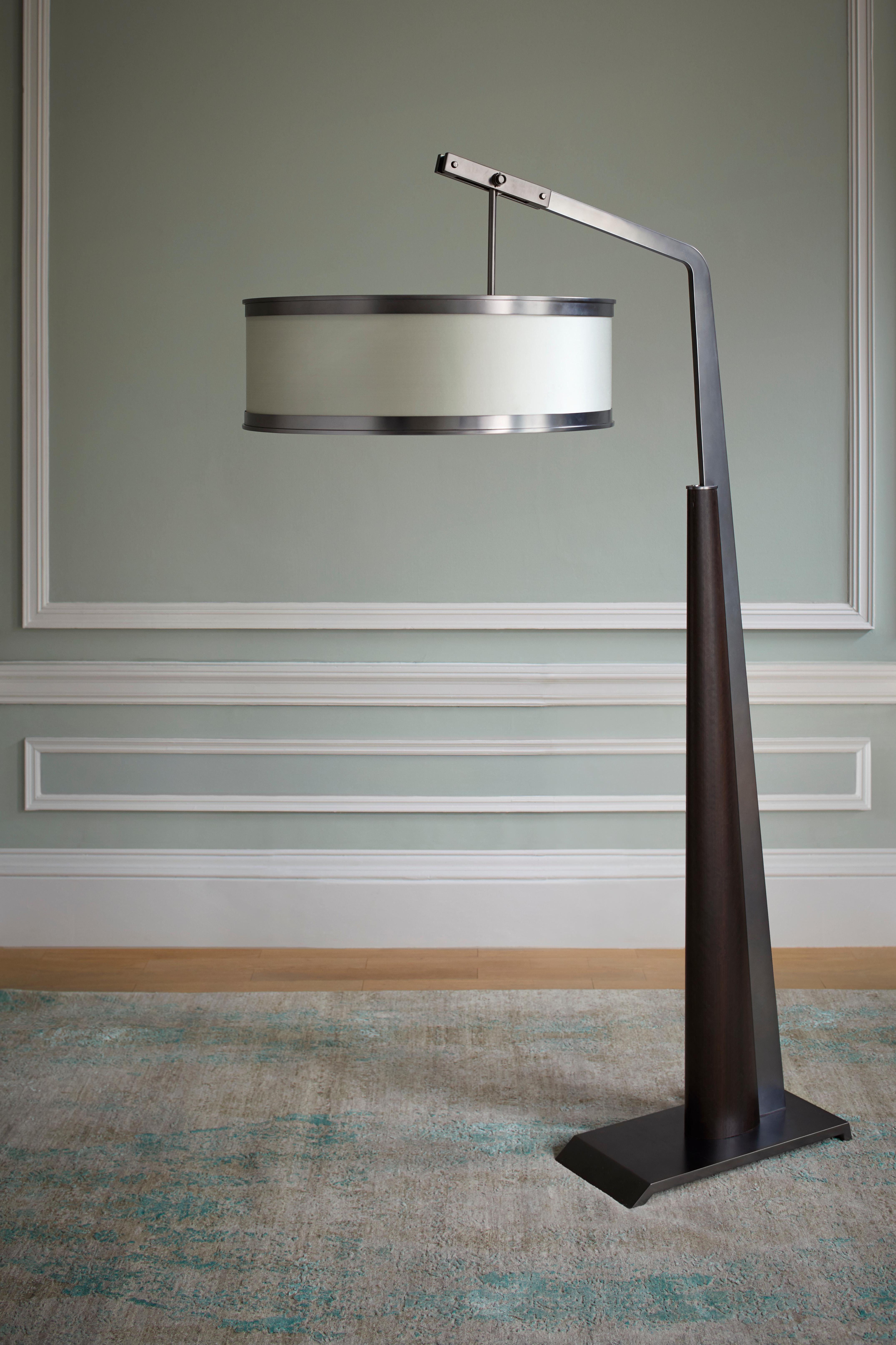 The Mintaka contemporary floor lamp is an architectural piece of furniture. The innovative asymmetry makes it possible to keep the base on a single plane. 

The metal rings on the lapmshade create a subtle ornamental light effect. 

*Custom