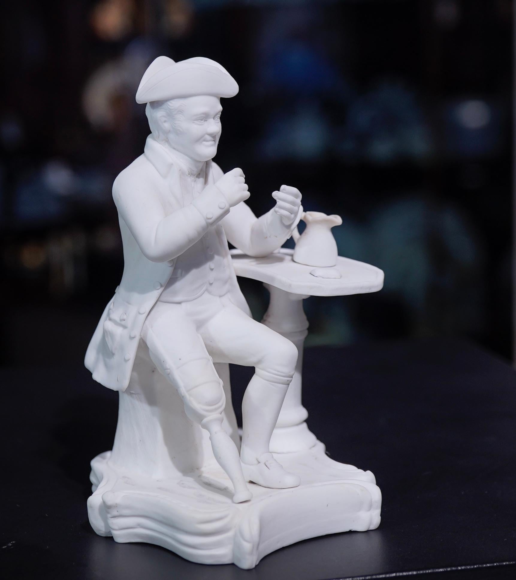 A Minton bisque figure of a “Greenwich pensioner”, modelled as a one legged veteran leaning on a table with a jug and glass, on a Rococo scroll base. Design No. 66 in the Minton pattern book.