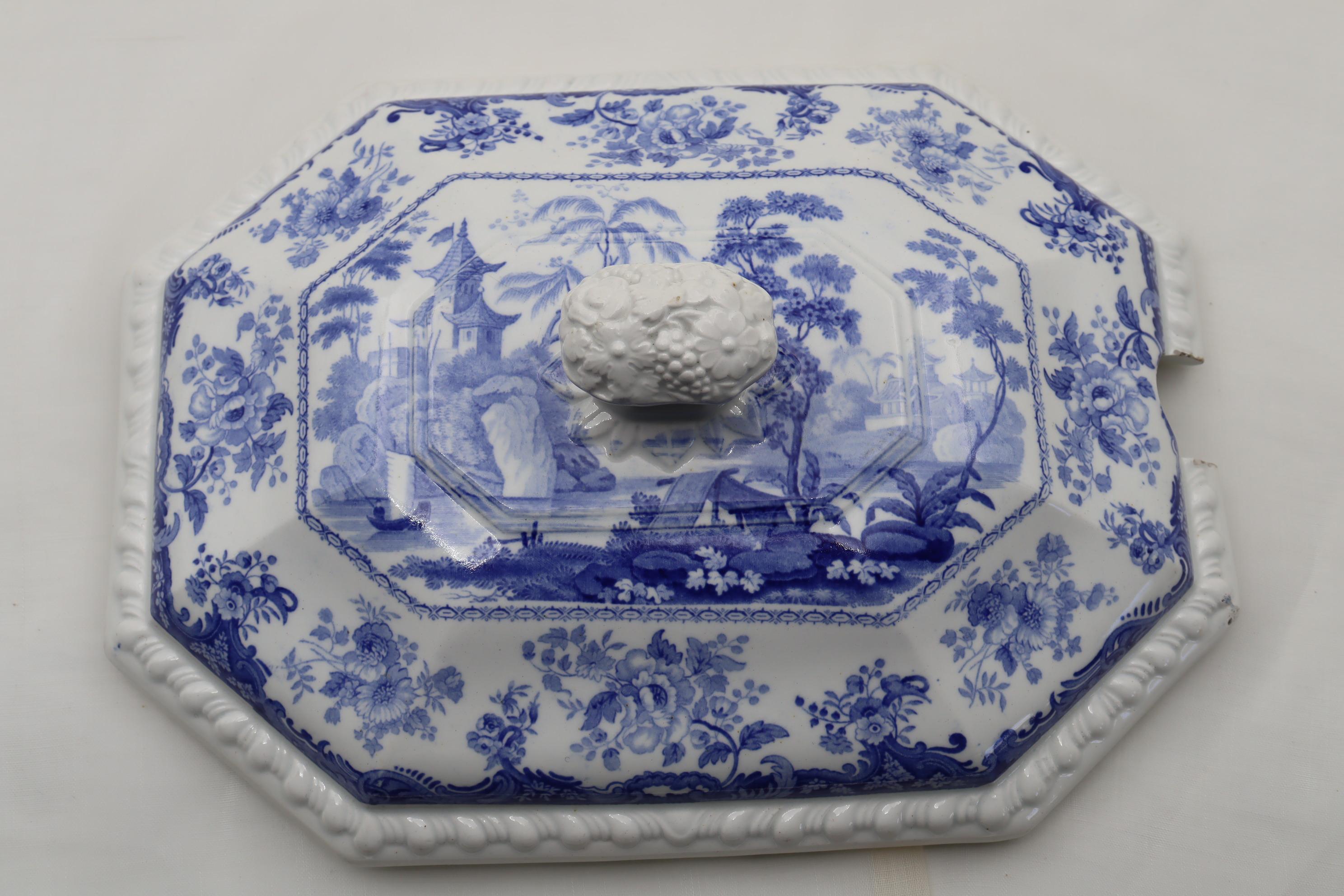 This octagonal soup tureen, under dish and ladle are decorated with Minton's 