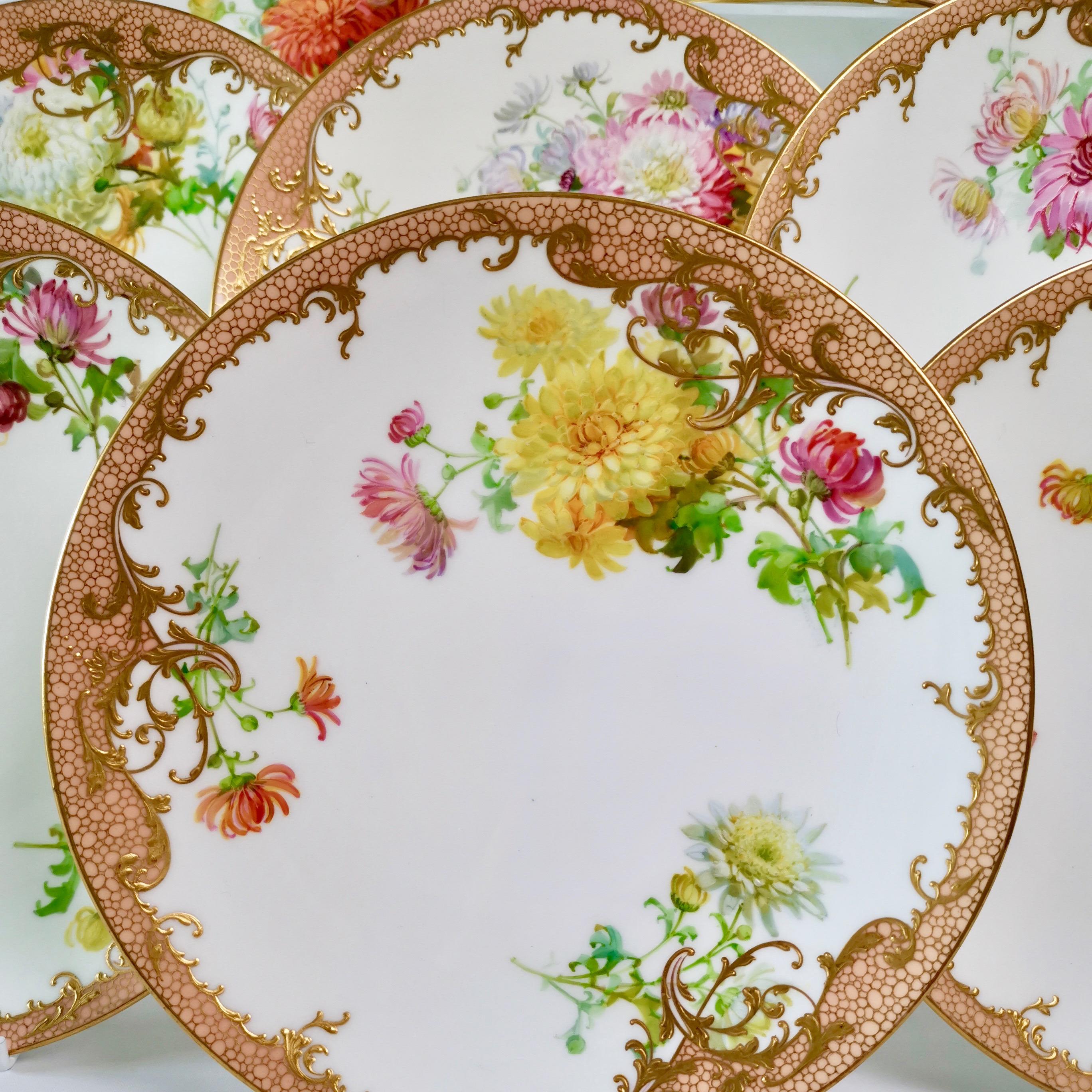 This is a stunning dessert service made by Minton in 1894, hand painted with beautiful chrysanthemums by Anton Connelly. The service consists of 10 plates and 3 low footed comports. Each piece is signed by the artist.

Minton was one of the