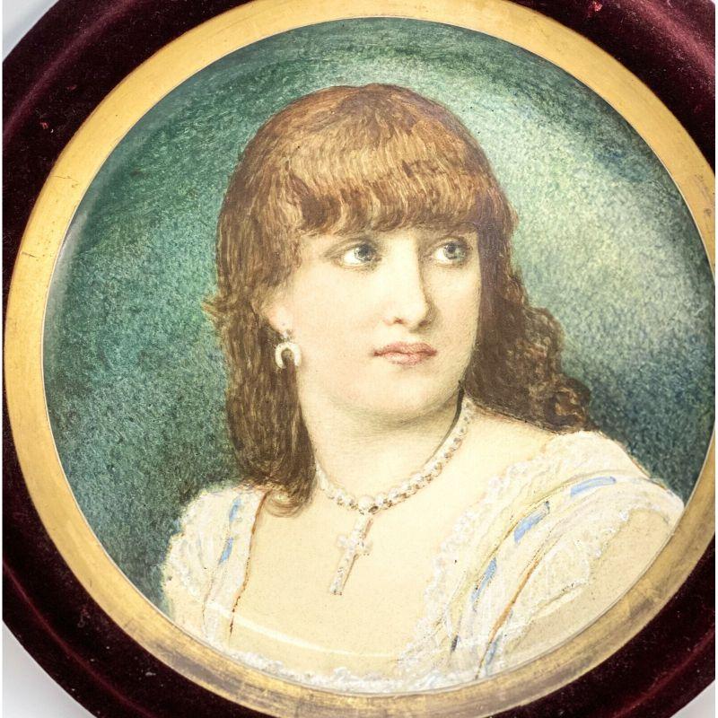 Minton England Porcelain large portrait charger beauty by William Coleman,1878

Minton England porcelain large portrait charger of a Beauty, 1878. The portrait depicts a period era beauty with bangs. Raised painted accents to the ruffled areas of