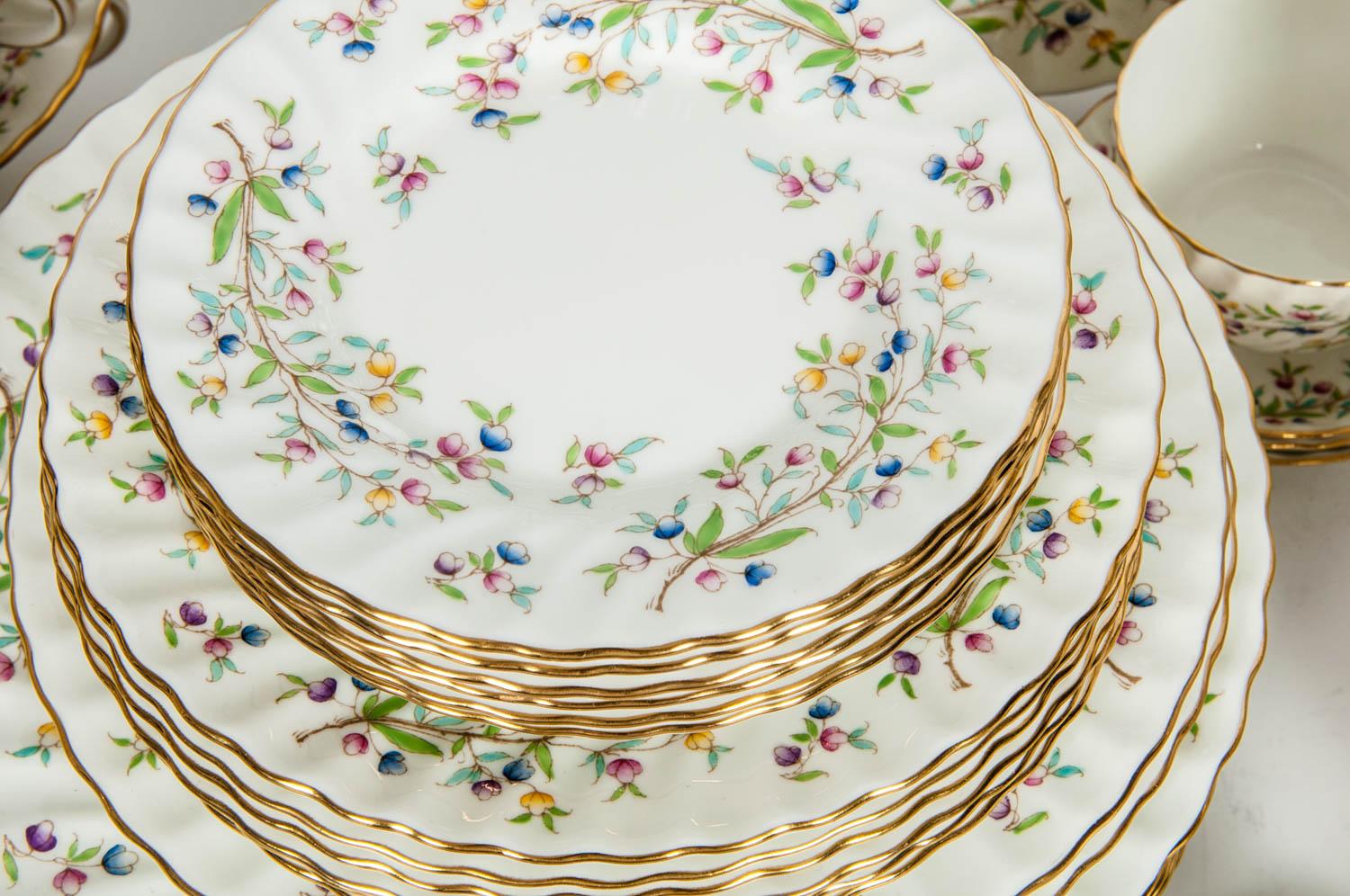 Minton English porcelain full service dinnerware for 12 people with serving pieces. Each piece is in excellent condition, maker's mark undersigned. The service include 12 Dinner, 12 Salad, 12 bread and butter, 12 dessert, 12 cups / saucers, 12 soup
