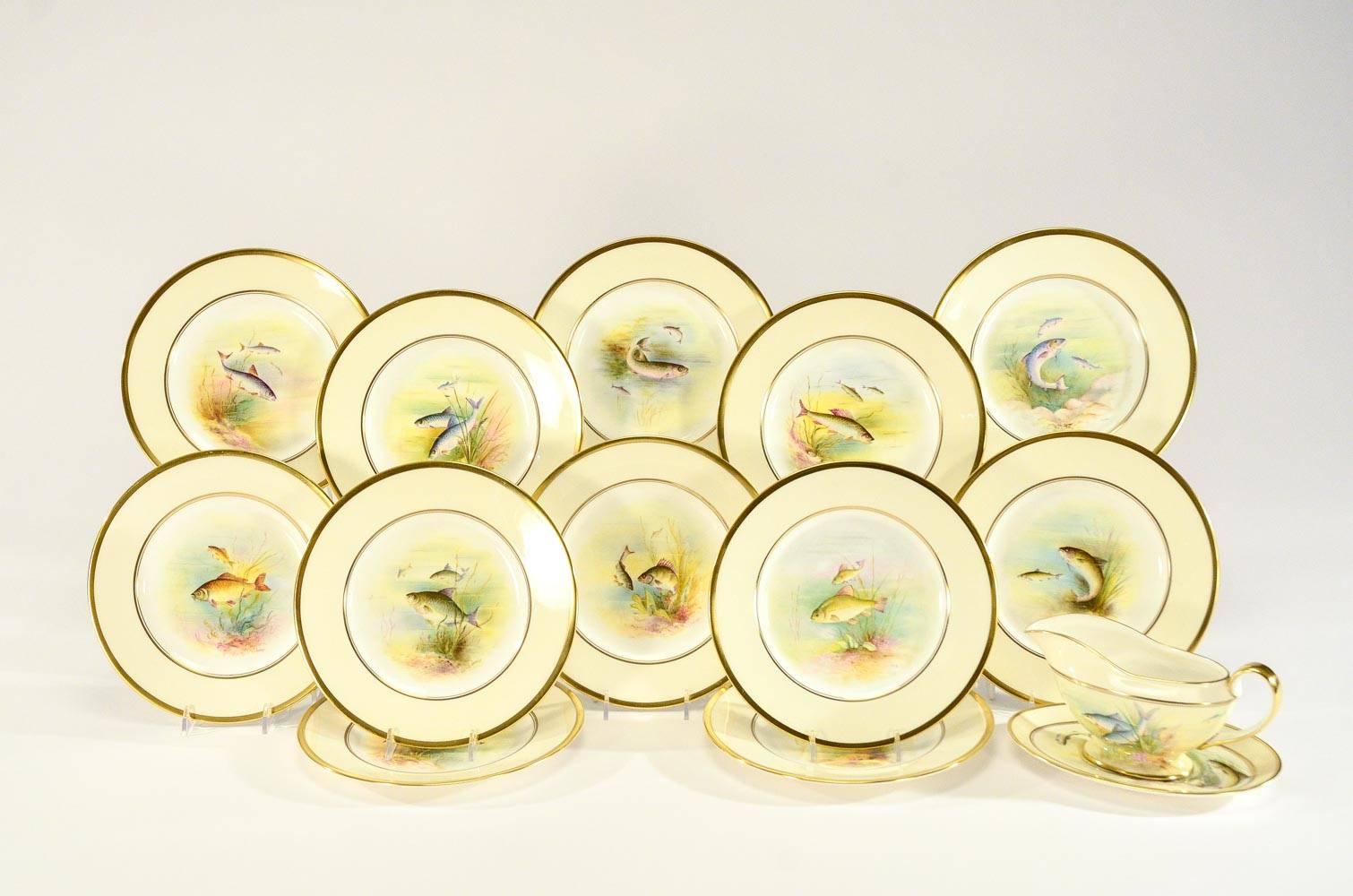 This a complete Minton fish service that is hand painted and Artist-signed consisting of 12 plates which measure 9.75