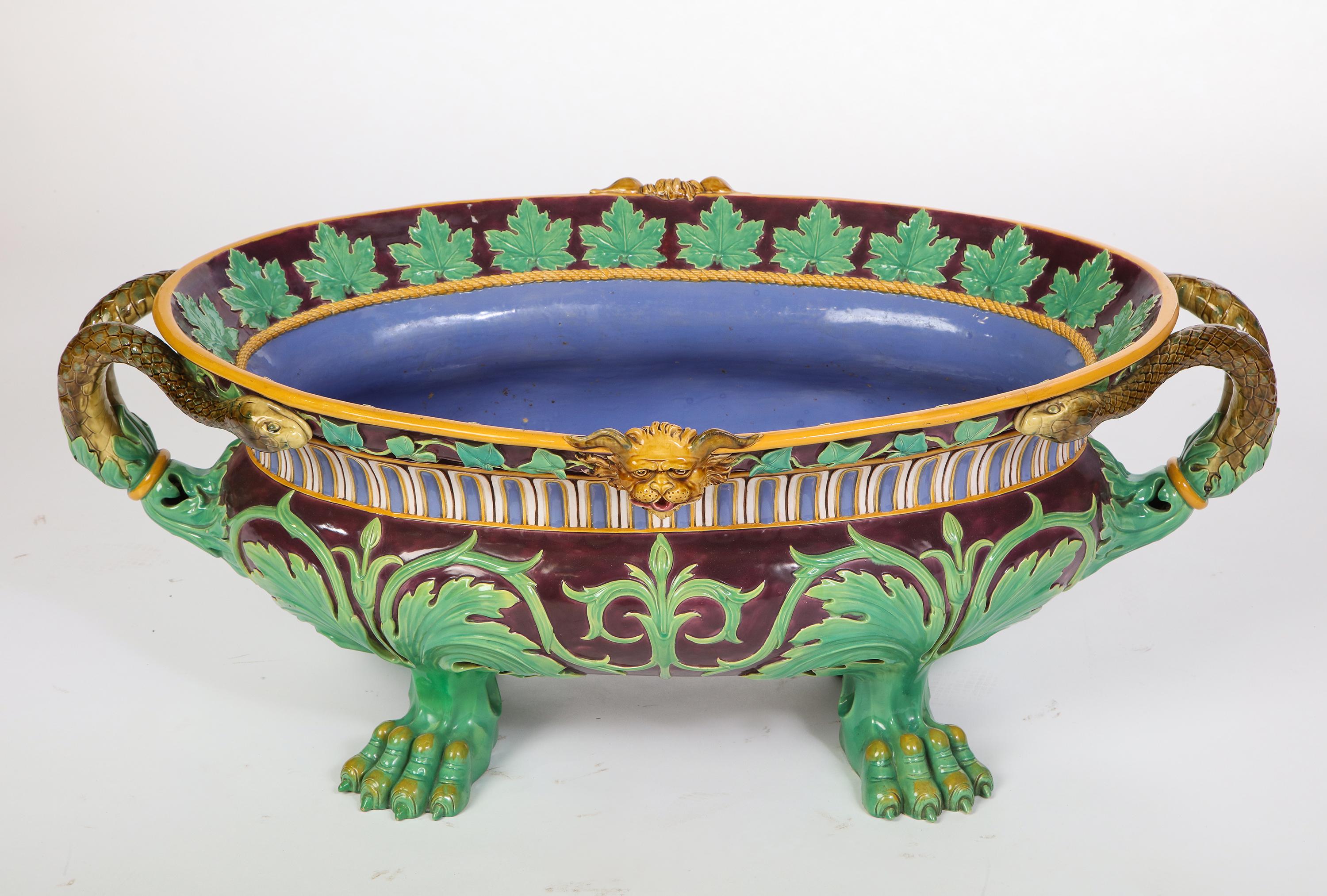 Recorded as shape no. 719, designed by Carlo Marochetti. 

In the Italian Renaissance taste, of oval form flanked by bifurcated snake handles with acanthus terminals, the rim interior applied with grape leaves, the exterior with ivy interrupted by