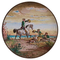 Assiette murale en majolique de Minton représentant une scène de paysage par Edouard Rischgitz