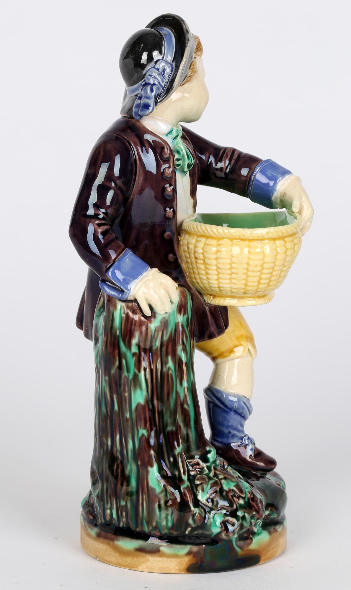 High Victorian Minton Majolica Pottery Boy Holding a Basket Probably for Salt For Sale