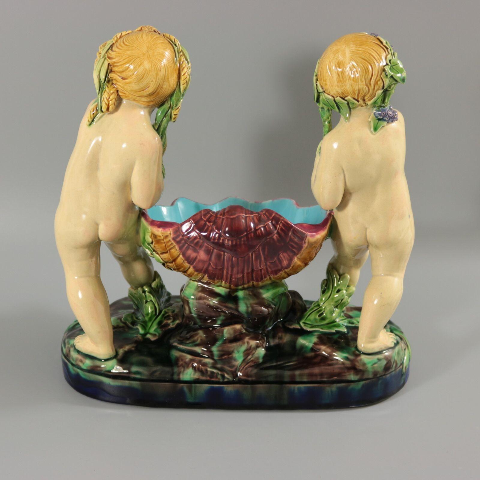 Mid-19th Century Minton Majolica Putti Shell Carriers For Sale