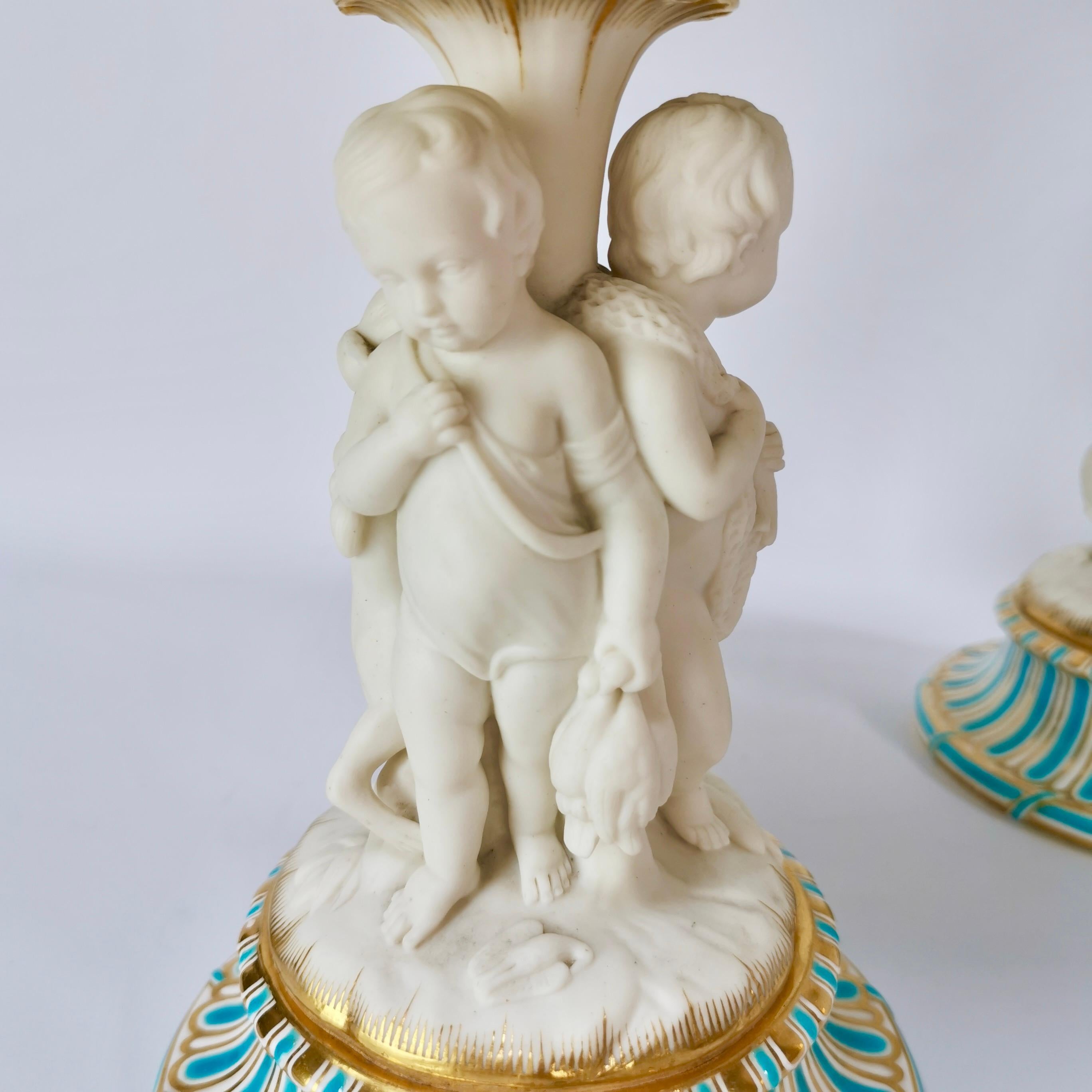 Molded Minton Pair of Tazzas, White Parian Porcelain Cherubs Hunting, Victorian ca 1880 For Sale