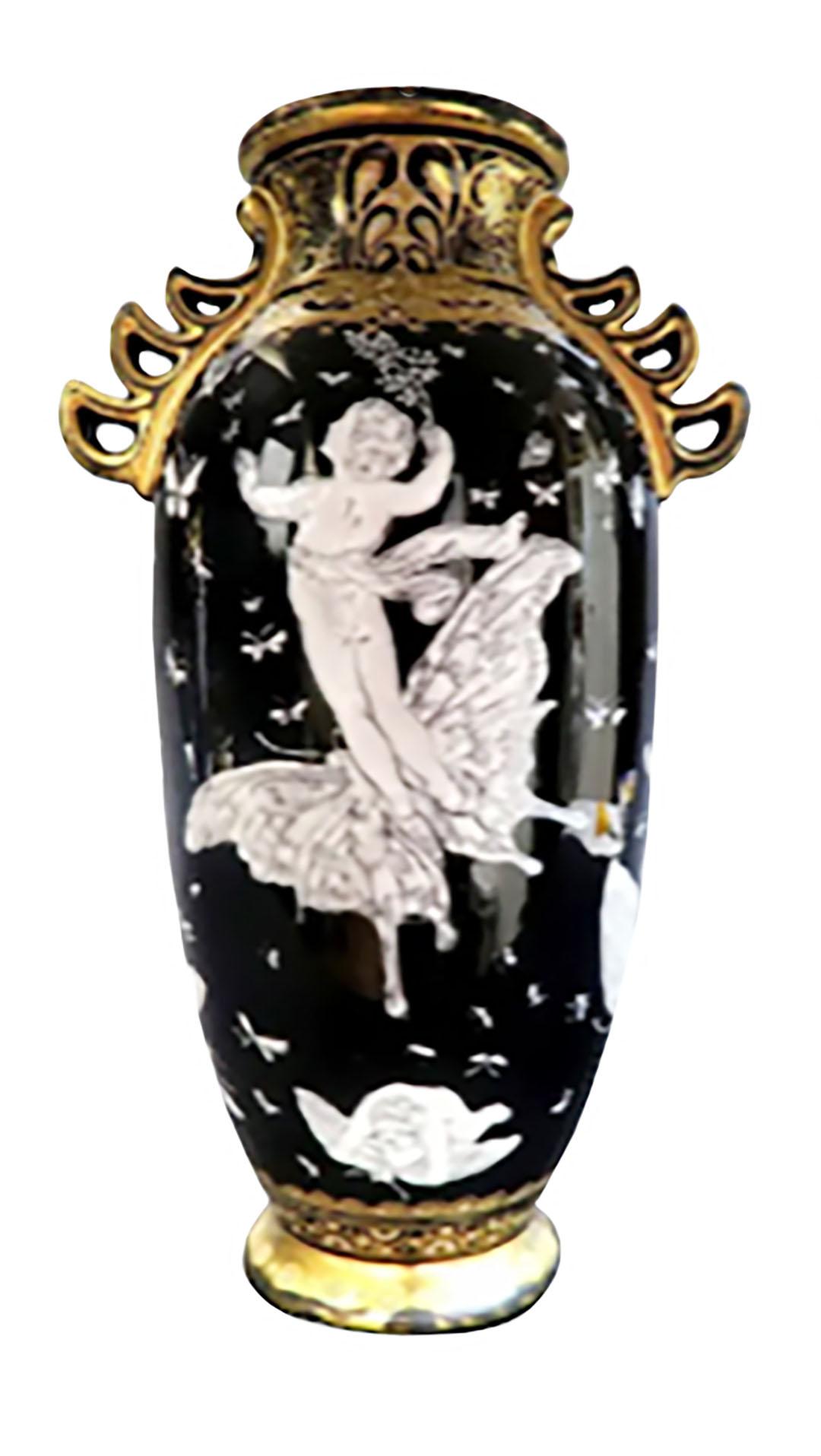 Pair of Minton pate sur pate style vases with white relief butterflies black white, and gold porcelain, circa 1900, England.