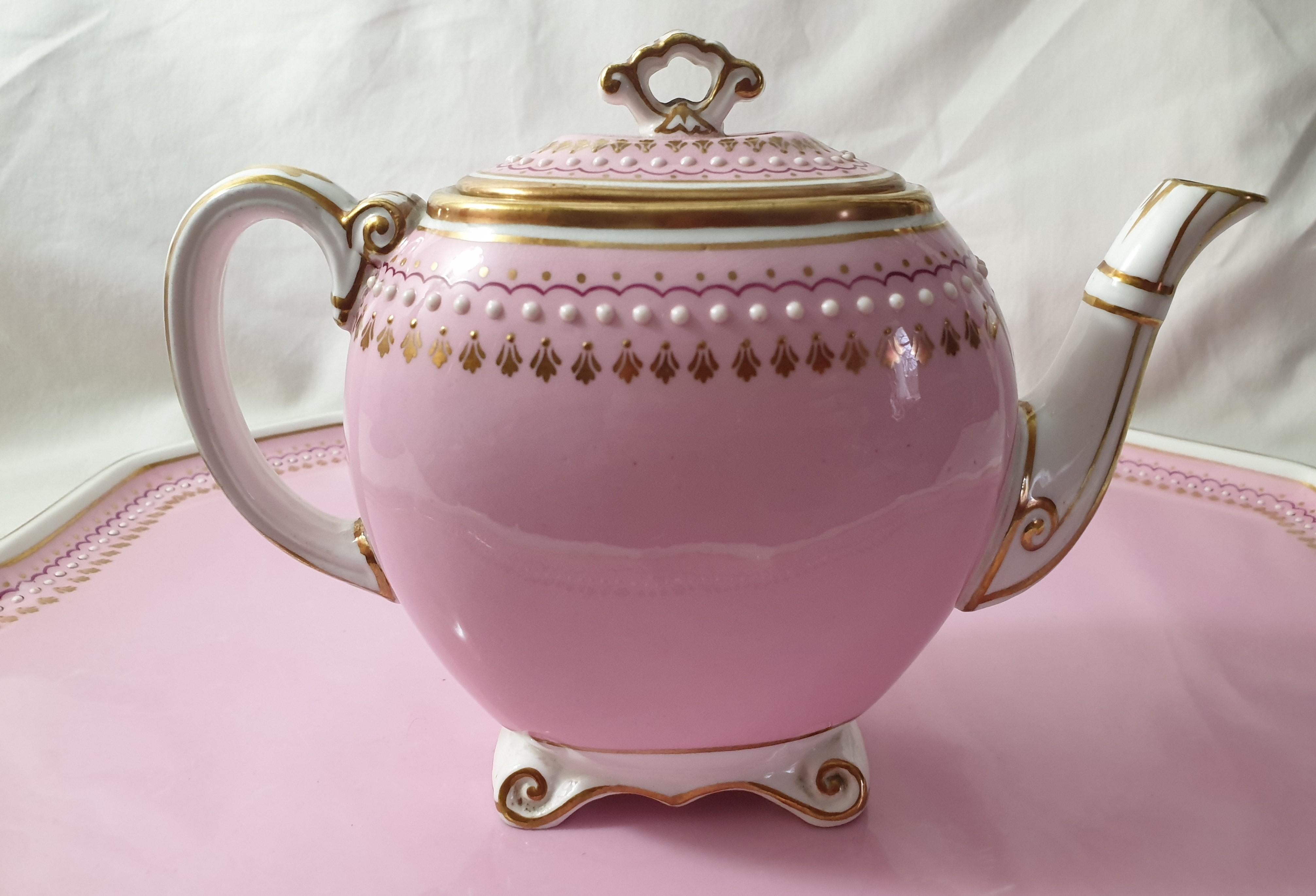 Very rare pink Minton jeweled cabaret set for 2.
Each piece is jeweled and hand painted. Set is in very good condition, with very little ware.
Dates 1871 impress mark pattern number 5993.
Set comprise of tray, tea-pot with lid, sugar-pot with