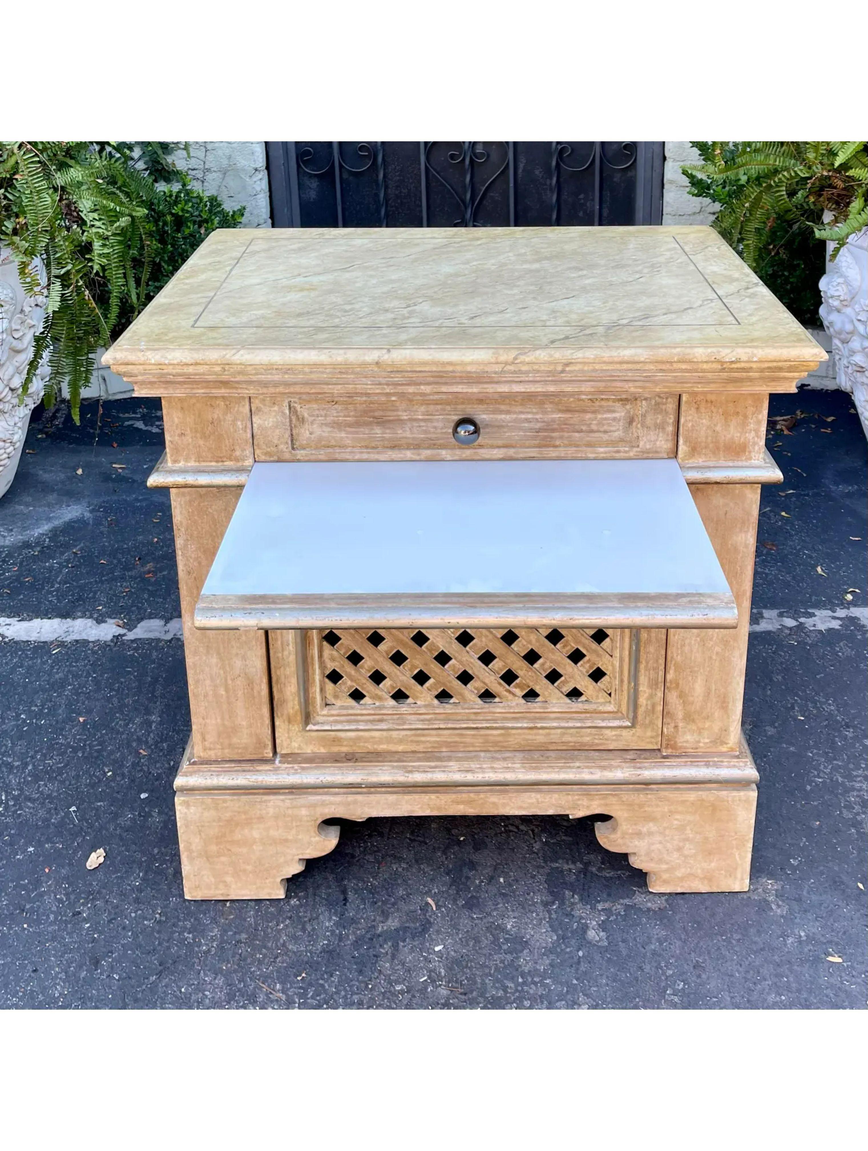 Minton-Spidell Italian Country Tuscany Style Side Table Nightstand Cabinet. It features a trompe l'oeil painted faux marble top, a single drawer, a platformier, and a fret work door.

Additional information: 
Materials: Paint, Wood
Color: