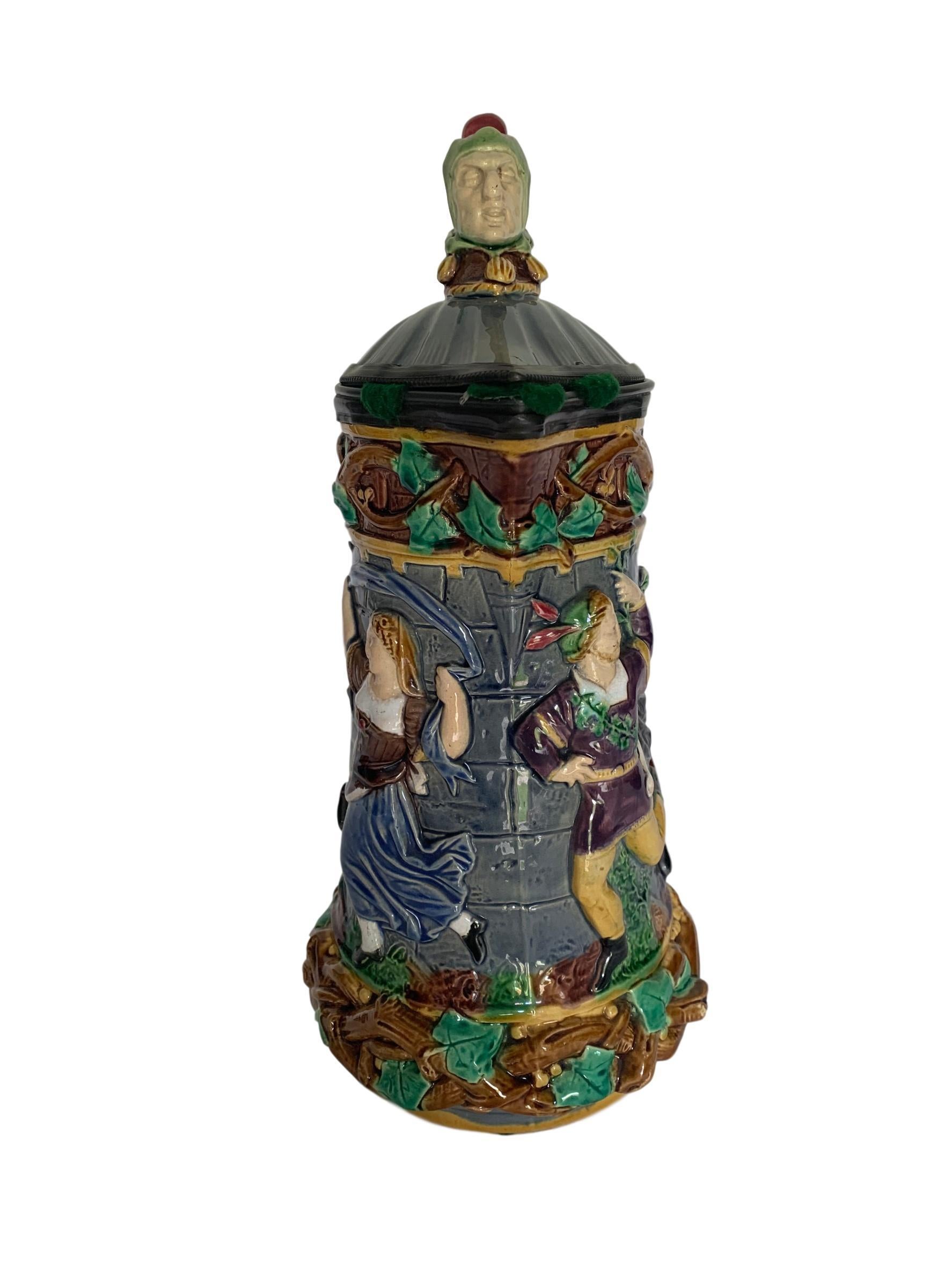 Minton Towered Jug w/ Pewter Lid & Medieval Dancers, English, date code 1876. 

For over 28 years we have been among the Nation’s preeminent specialists in fine antique majolica. 

Literature:
Marilyn G. Karmason and Joan B. Stake, Majolica: A