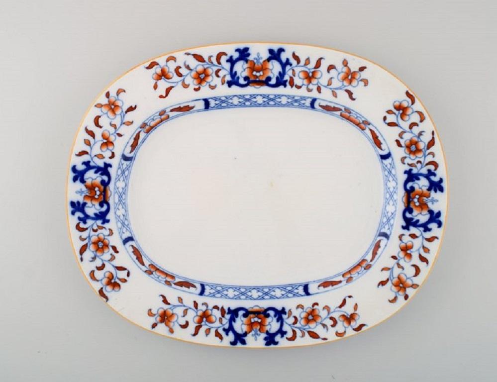 Mintons, England. Three antique dishes in hand-painted faience. Chinese style, early 20th century.
Largest measures: 42 x 34 cm.
In excellent condition with light wear.
Stamped.