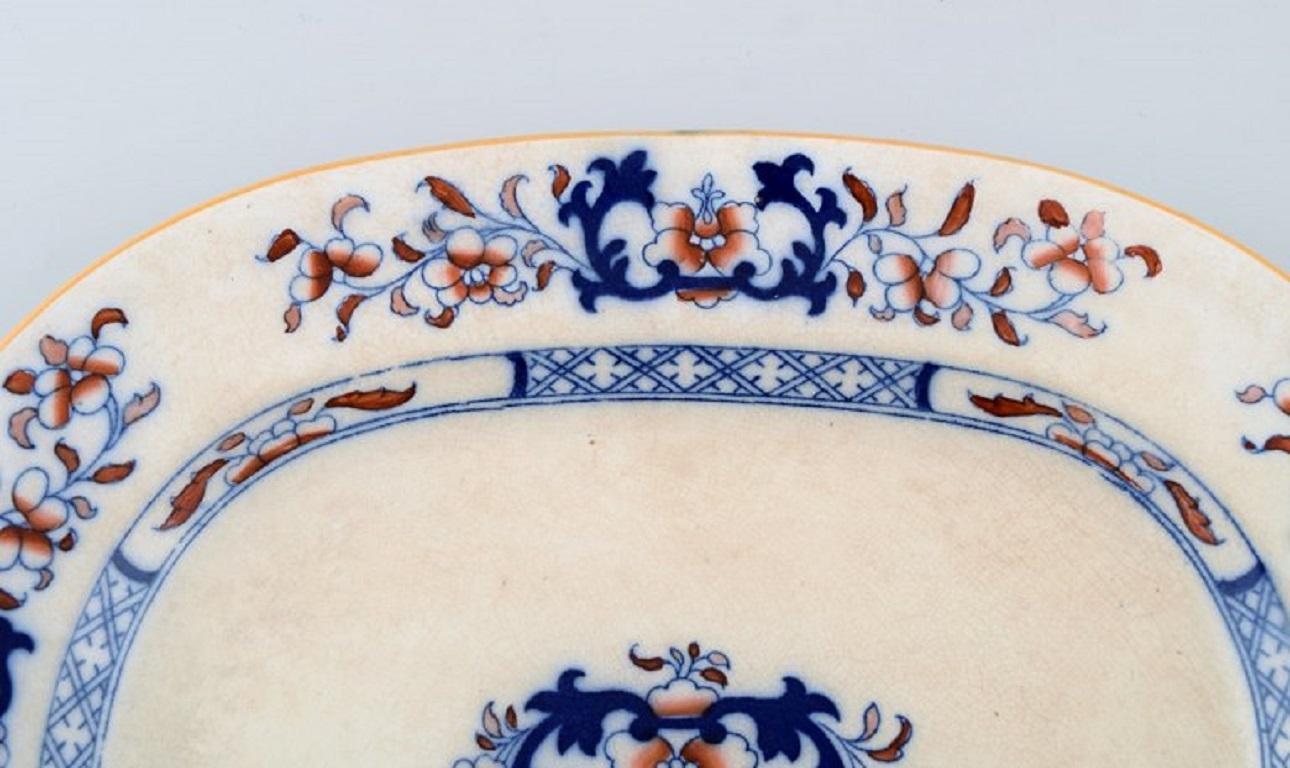 Anglais Deux plats anciens en faïence peints à la main, de style chinois, Mintons, Angleterre en vente