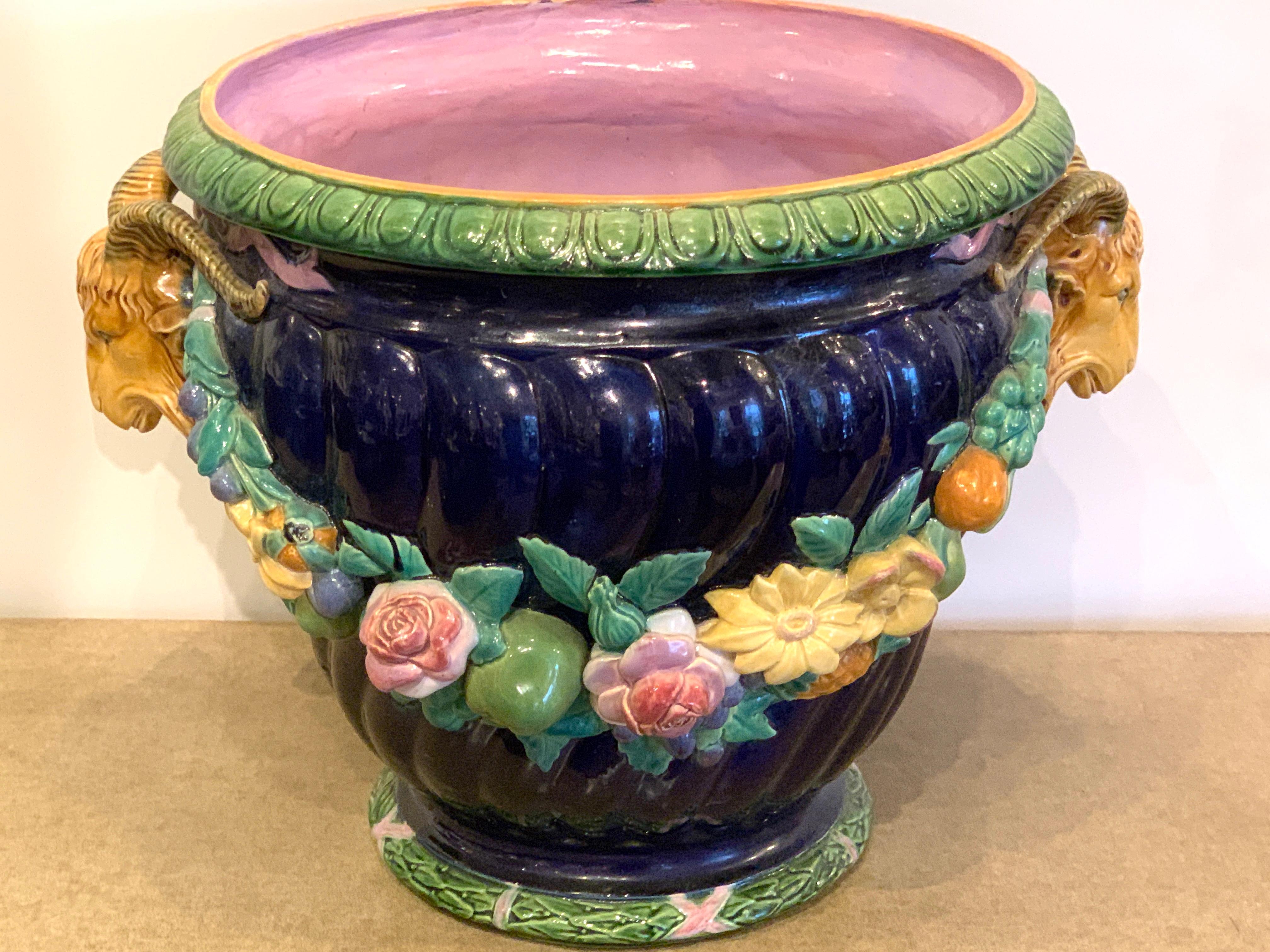 Mintons Majolica Jardinière designed by Baron Carlo Marochetti
Consisting of two pieces with cobalt blue background, Marked and date stamped for 1876, shape number 727
Jardinière 13.5