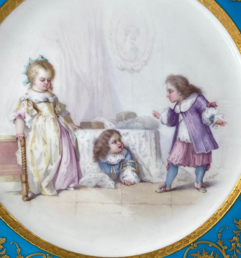 An exceptionally fine Mintons porcelain plate, signed by Louis Eugene Sieffert, c. 1880, for A.B. Daniell & Son, Wigmore Street, London. Beautifully hand painted with a titled scene ‘Le Tartufe’, depicting three children in Period French costume,