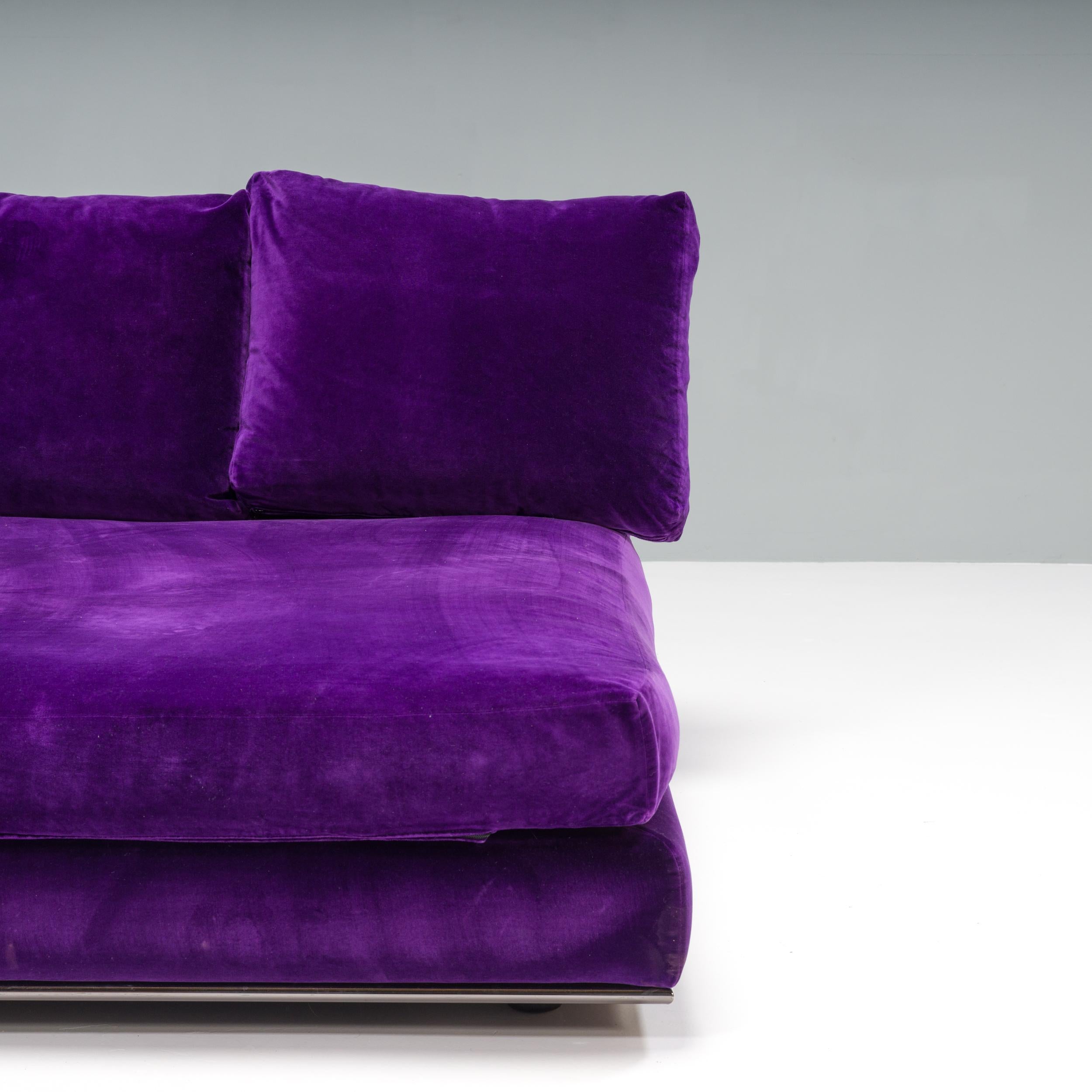 Designed by Minotti, this day bed allows for luxurious lounging. With generous proportions, the bed sits on a slimline chrome frame which gives the impression it is floating slightly above the ground.

Fully upholstered in a bold purple velvet, the